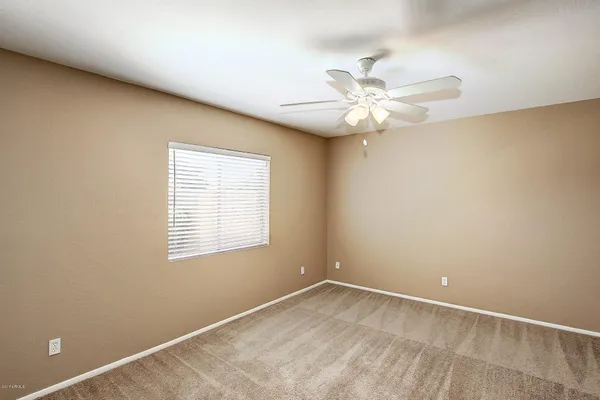 a view of pool table and chairs