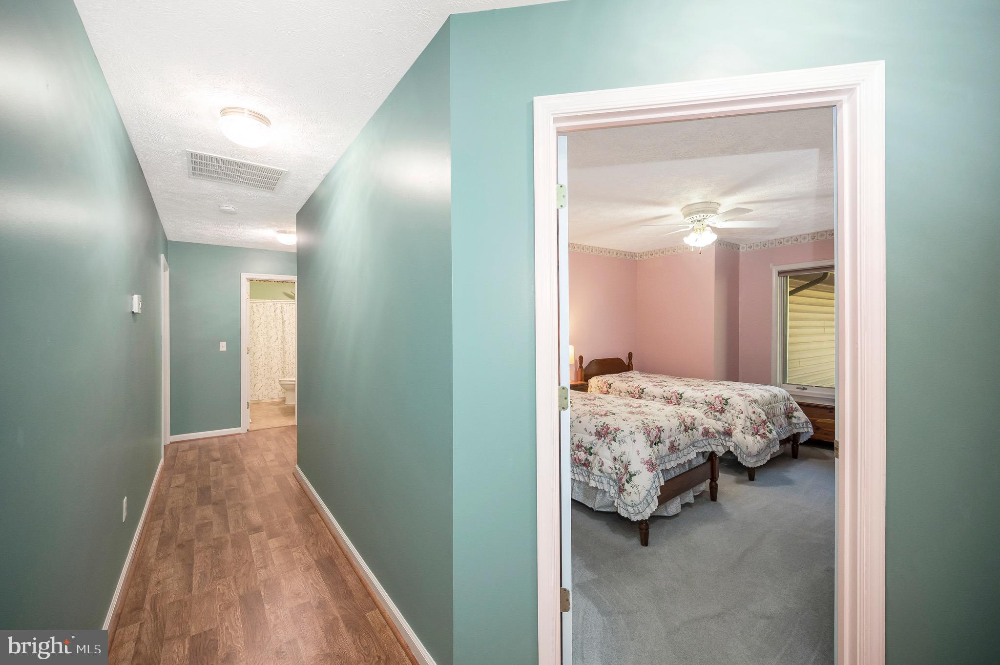 221 Washington Street Locust Grove, VA 22508 - Photo 19 of 48 a bedroom with a bed and a mirror