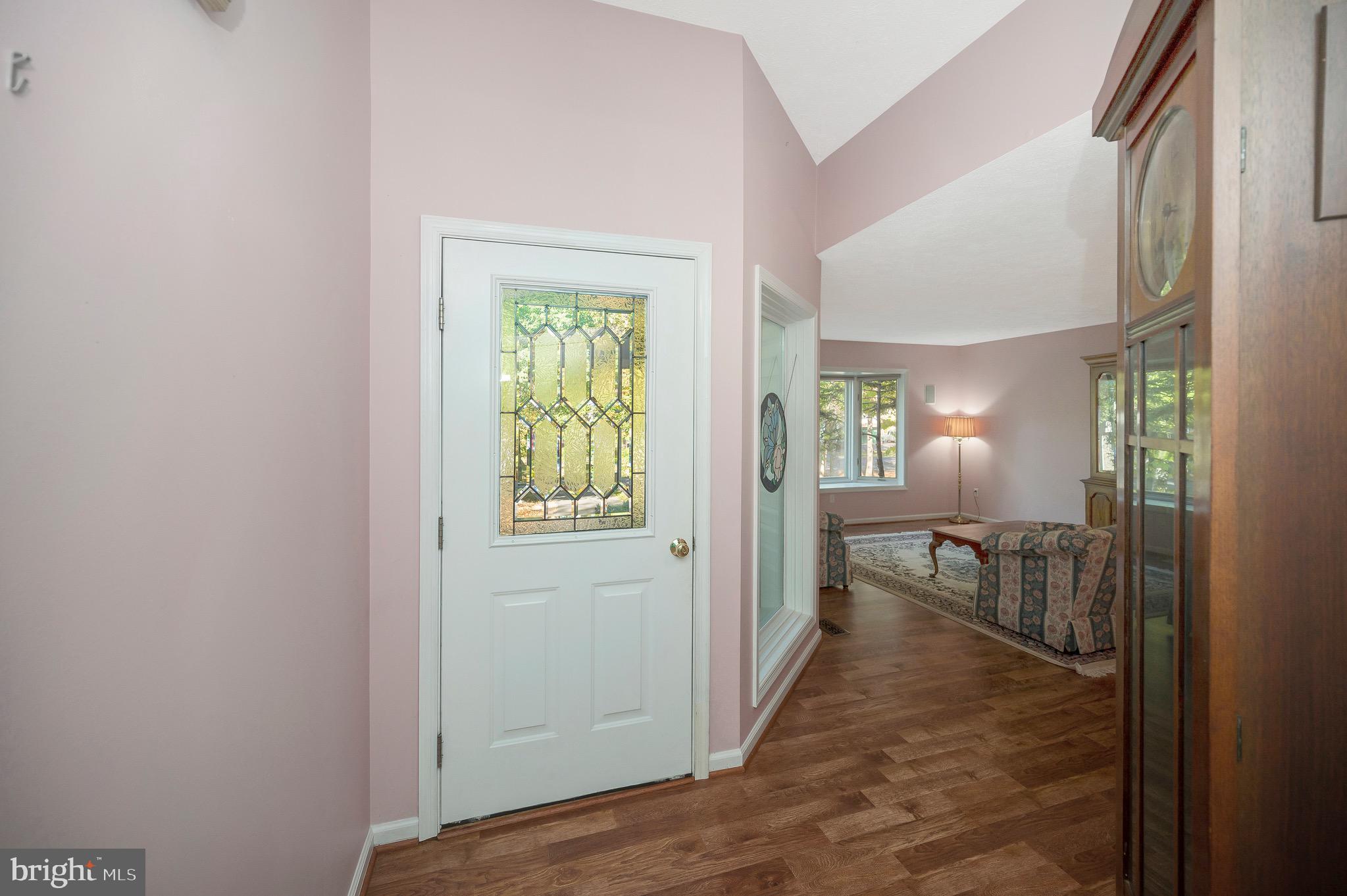221 Washington Street Locust Grove, VA 22508 - Photo 3 of 48 a view of hallway with livingroom and furniture