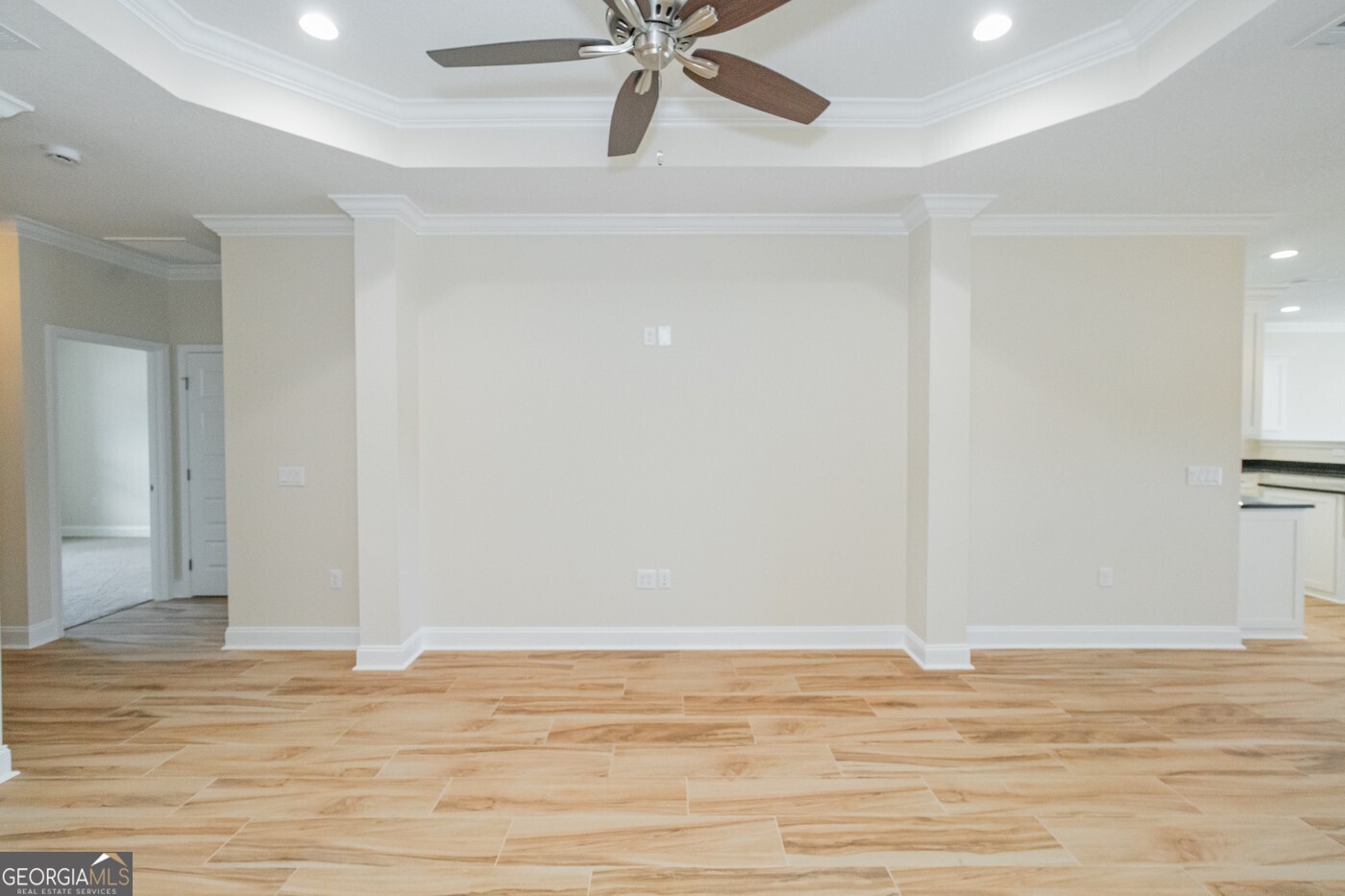 214 The Villas Way Kingsland, GA 31548 - Photo 19 of 47 a view of a room with wooden floor and ceiling fan