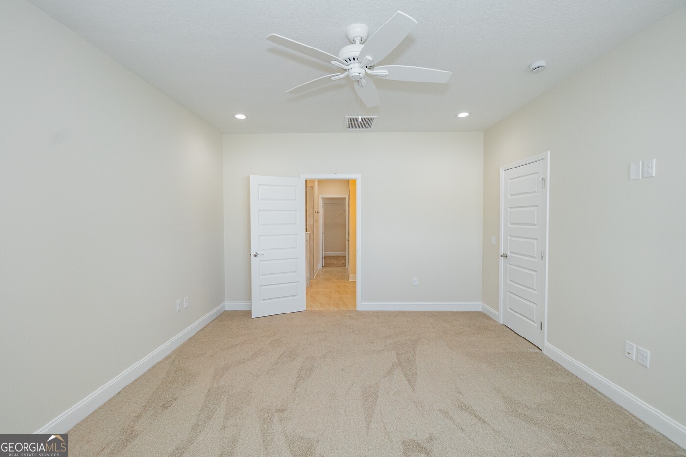 214 The Villas Way Kingsland, GA 31548 - Photo 23 of 47 an empty room with fan and a ceiling fan