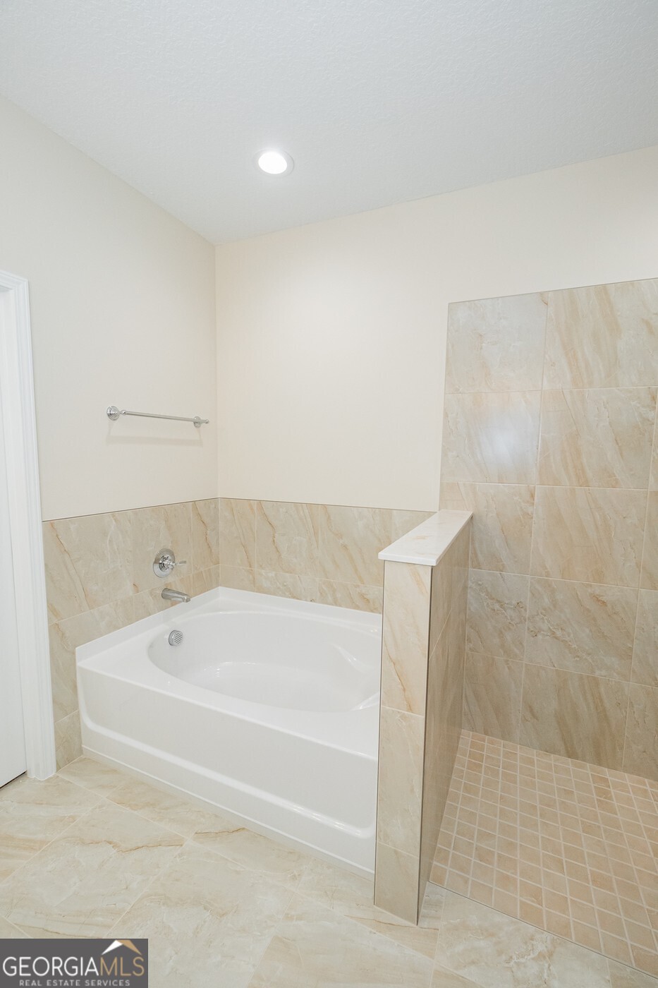 214 The Villas Way Kingsland, GA 31548 - Photo 26 of 47 a bathroom with a bathtub and shower