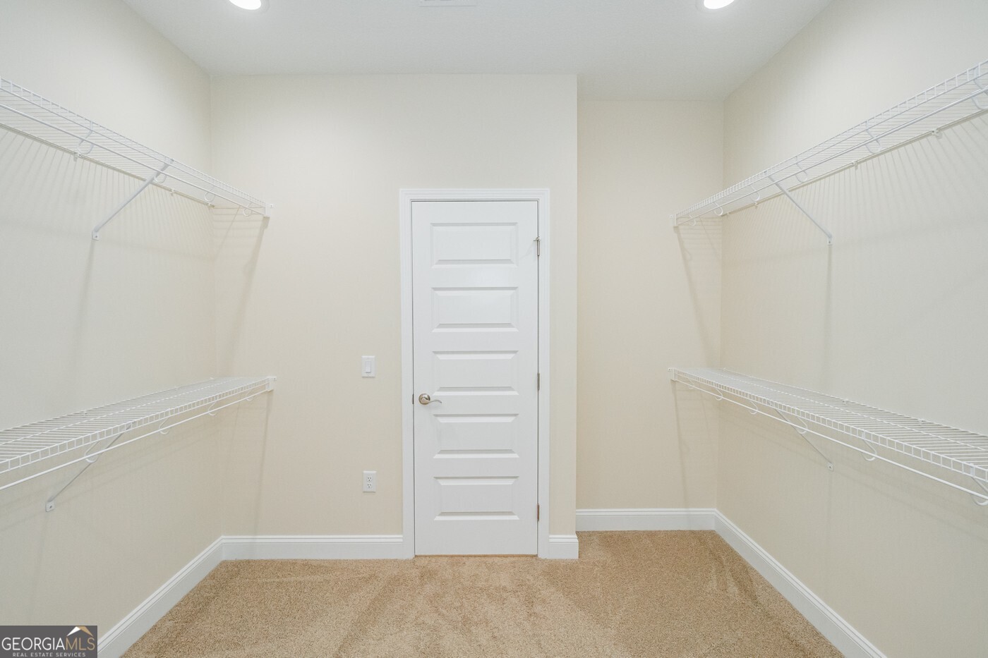 214 The Villas Way Kingsland, GA 31548 - Photo 31 of 47 a view of an empty walk in closet