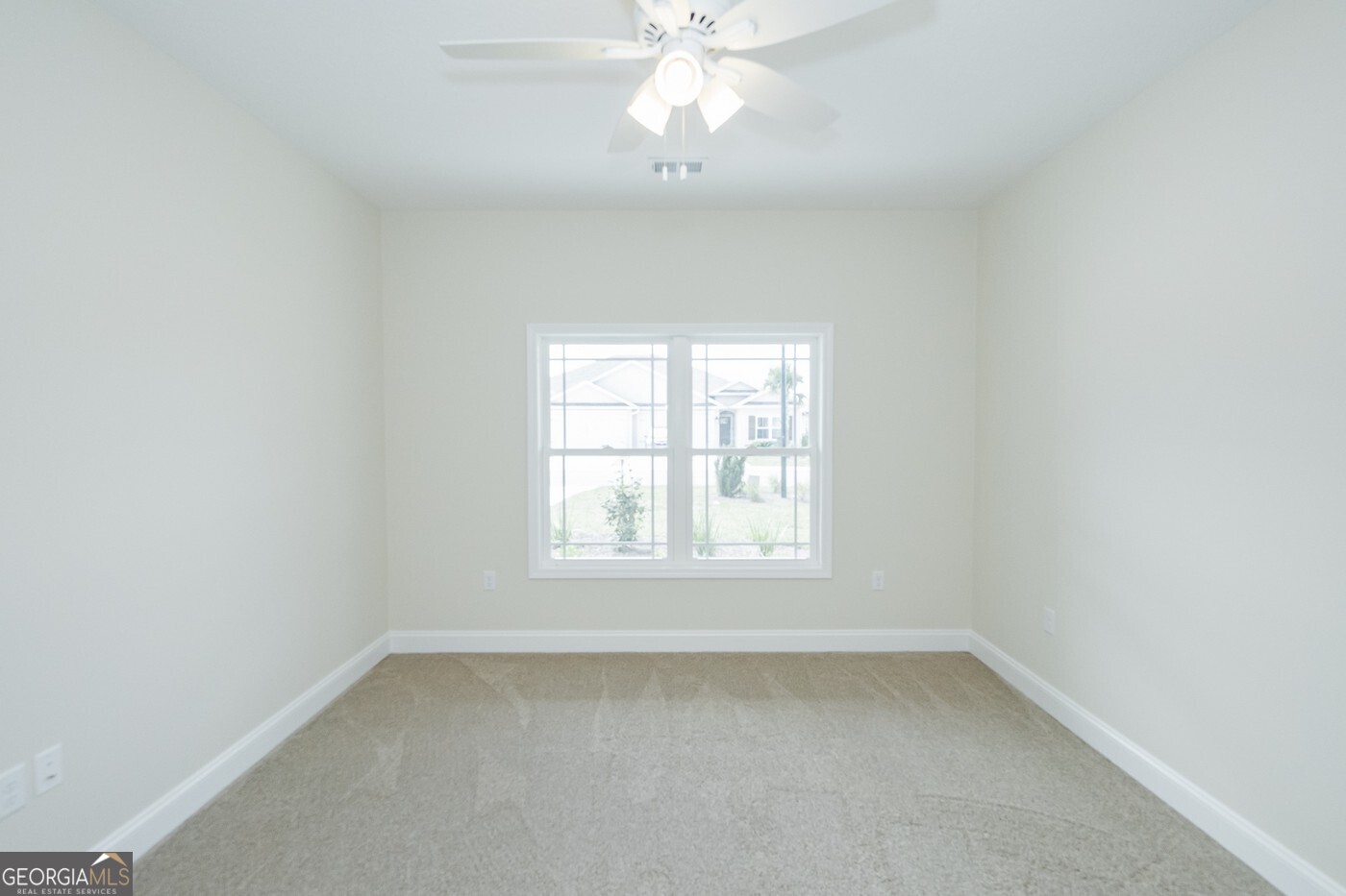214 The Villas Way Kingsland, GA 31548 - Photo 33 of 47 an empty room with a window