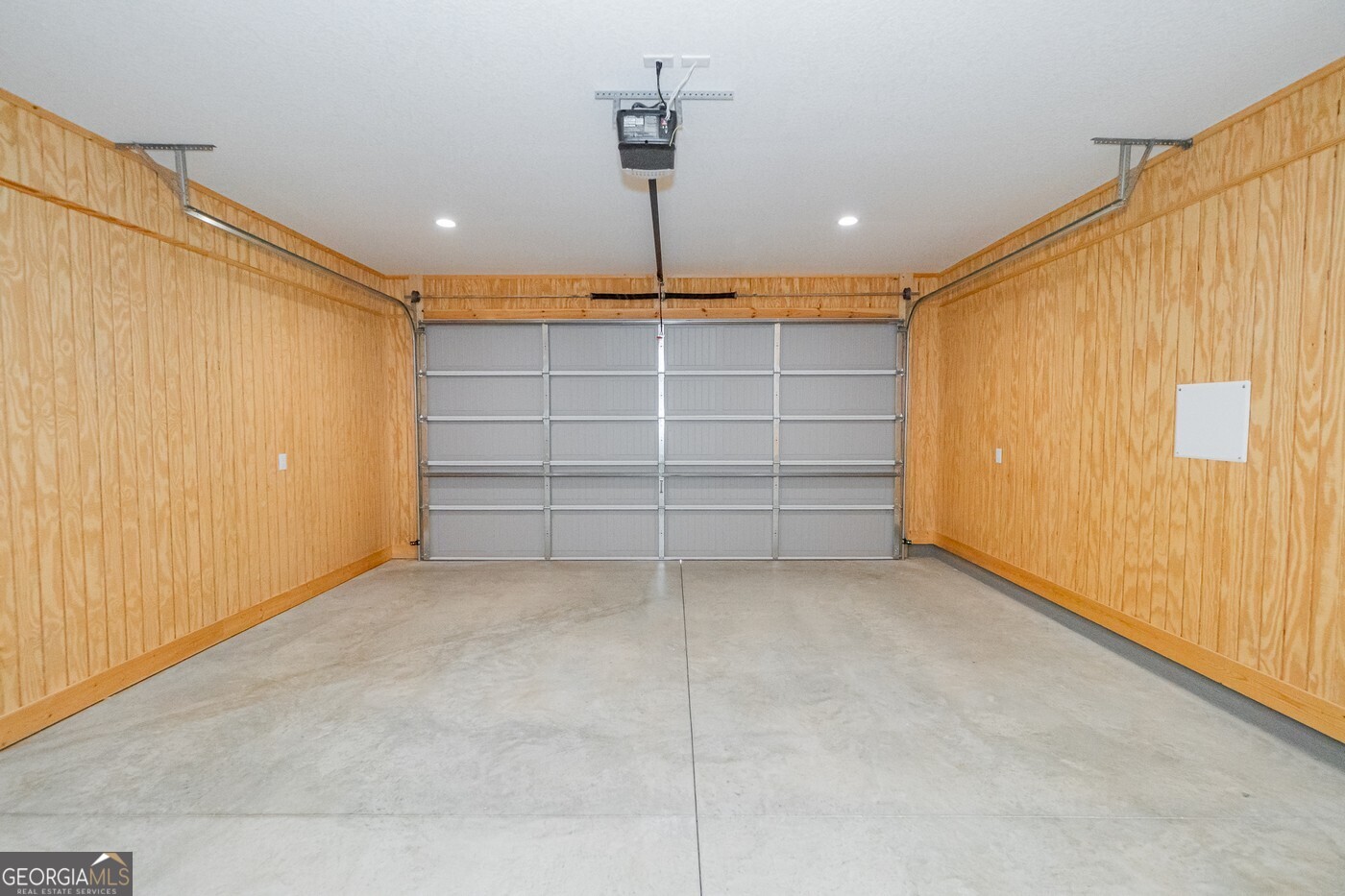 214 The Villas Way Kingsland, GA 31548 - Photo 42 of 47 a view of room that has a garage