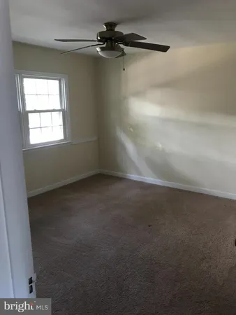 a view of a refrigerator in a room