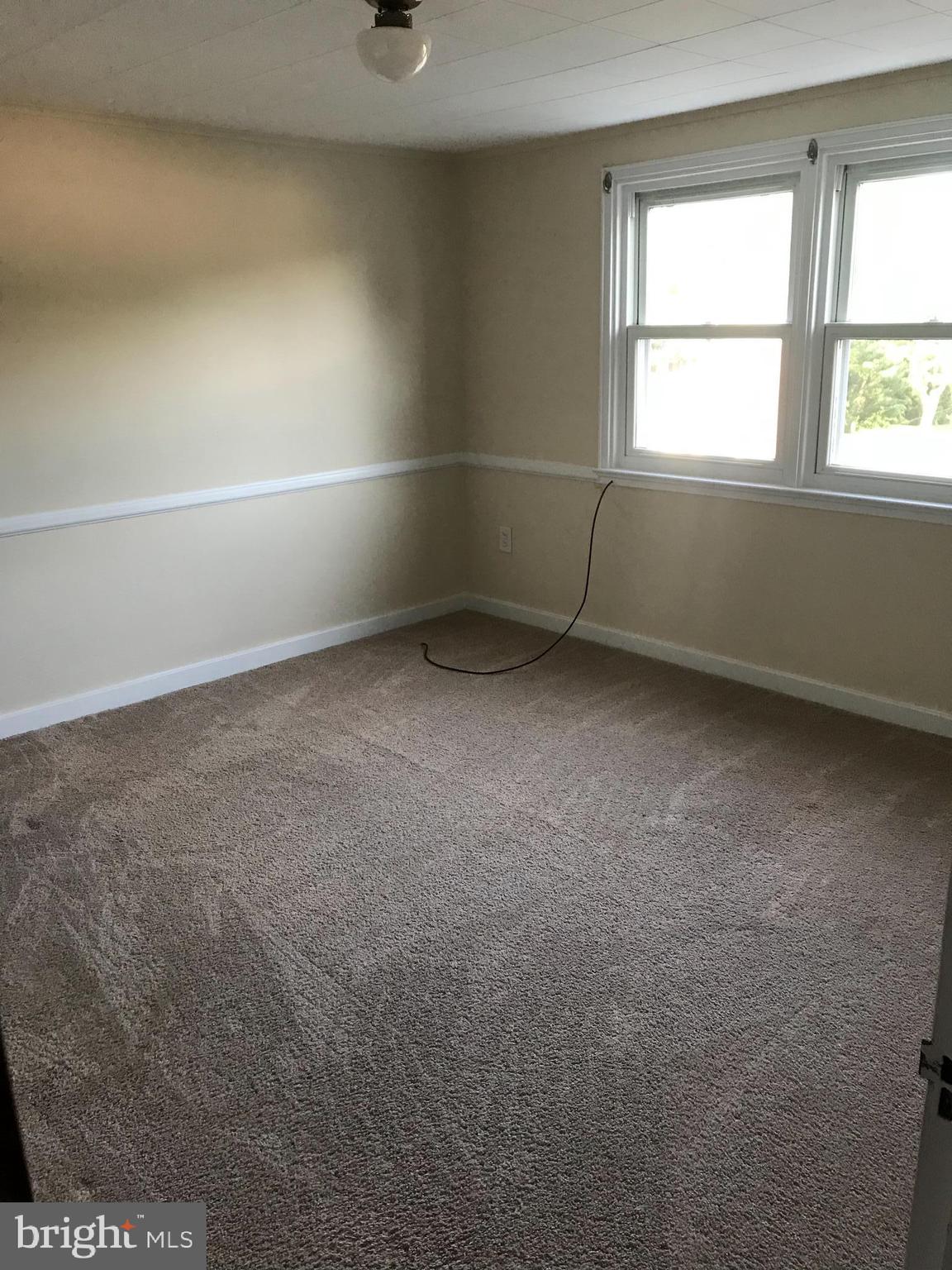 205 Sycamore Road Reading, PA 19611 - Photo 8 of 8 an empty room with a window