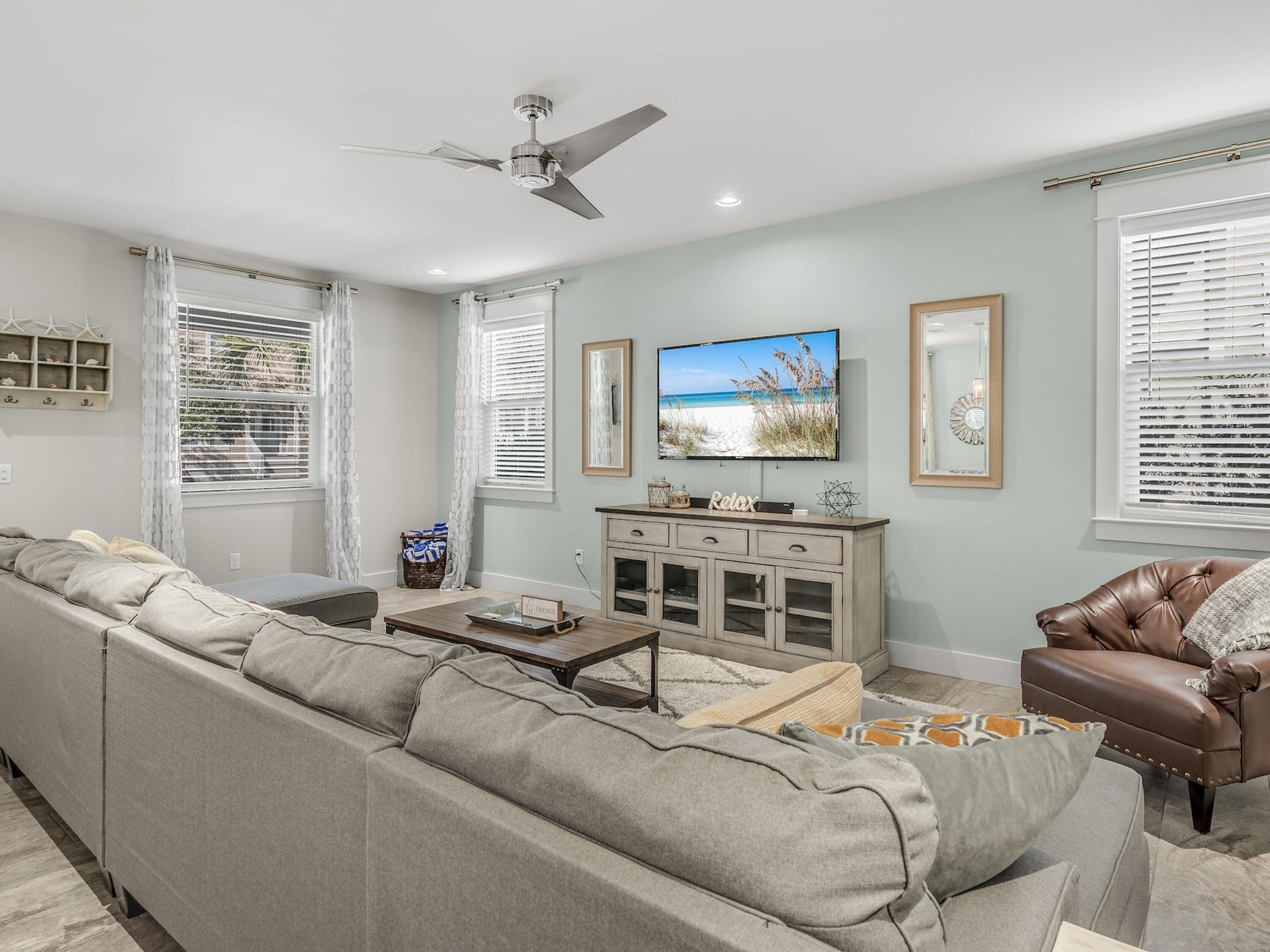 77 Snapper Street Santa Rosa Beach, FL 32459 - Photo 11 of 54 a living room with furniture and a flat screen tv