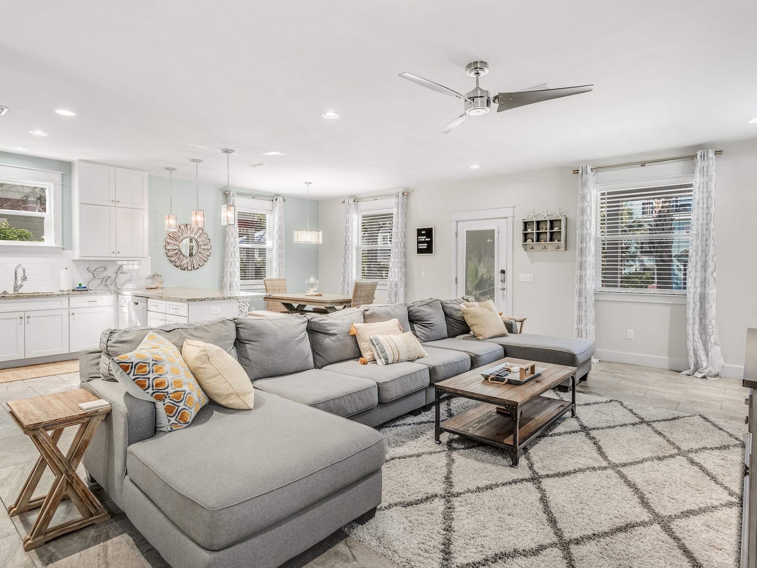 77 Snapper Street Santa Rosa Beach, FL 32459 - Photo 12 of 54 a living room with furniture and a ceiling fan