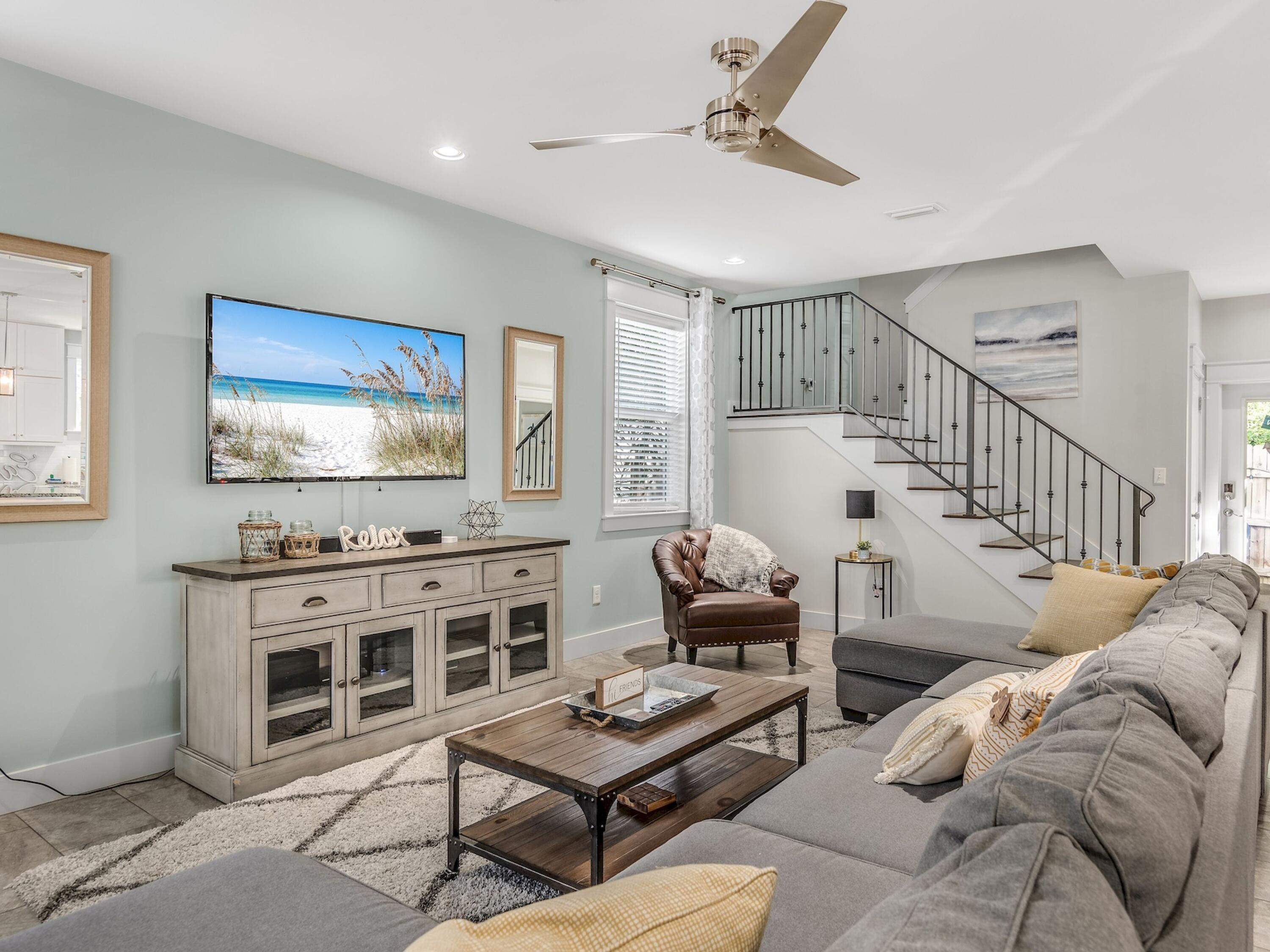 77 Snapper Street Santa Rosa Beach, FL 32459 - Photo 13 of 54 a living room with furniture and a flat screen tv