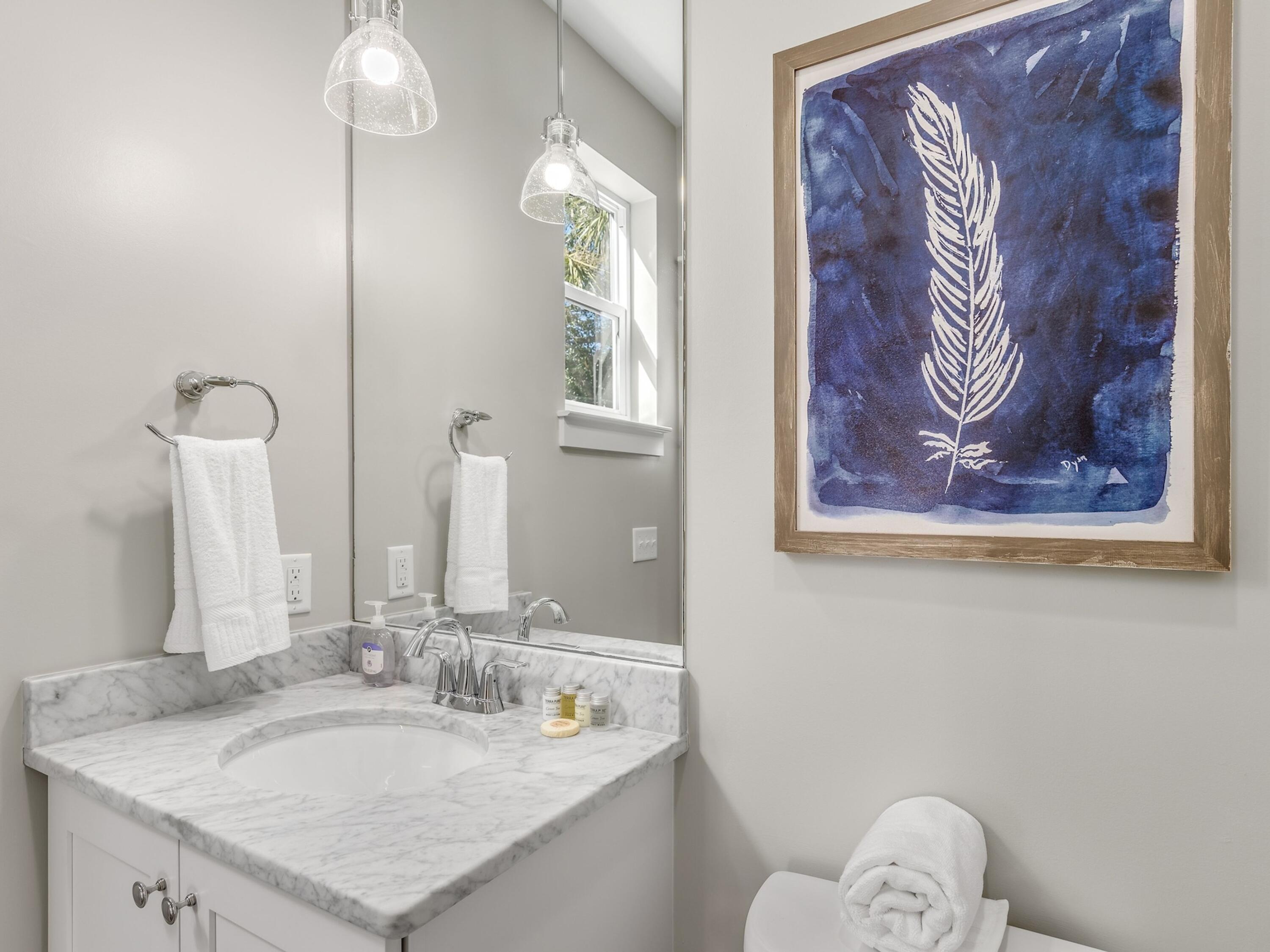 77 Snapper Street Santa Rosa Beach, FL 32459 - Photo 18 of 54 a bathroom with a sink and a mirror