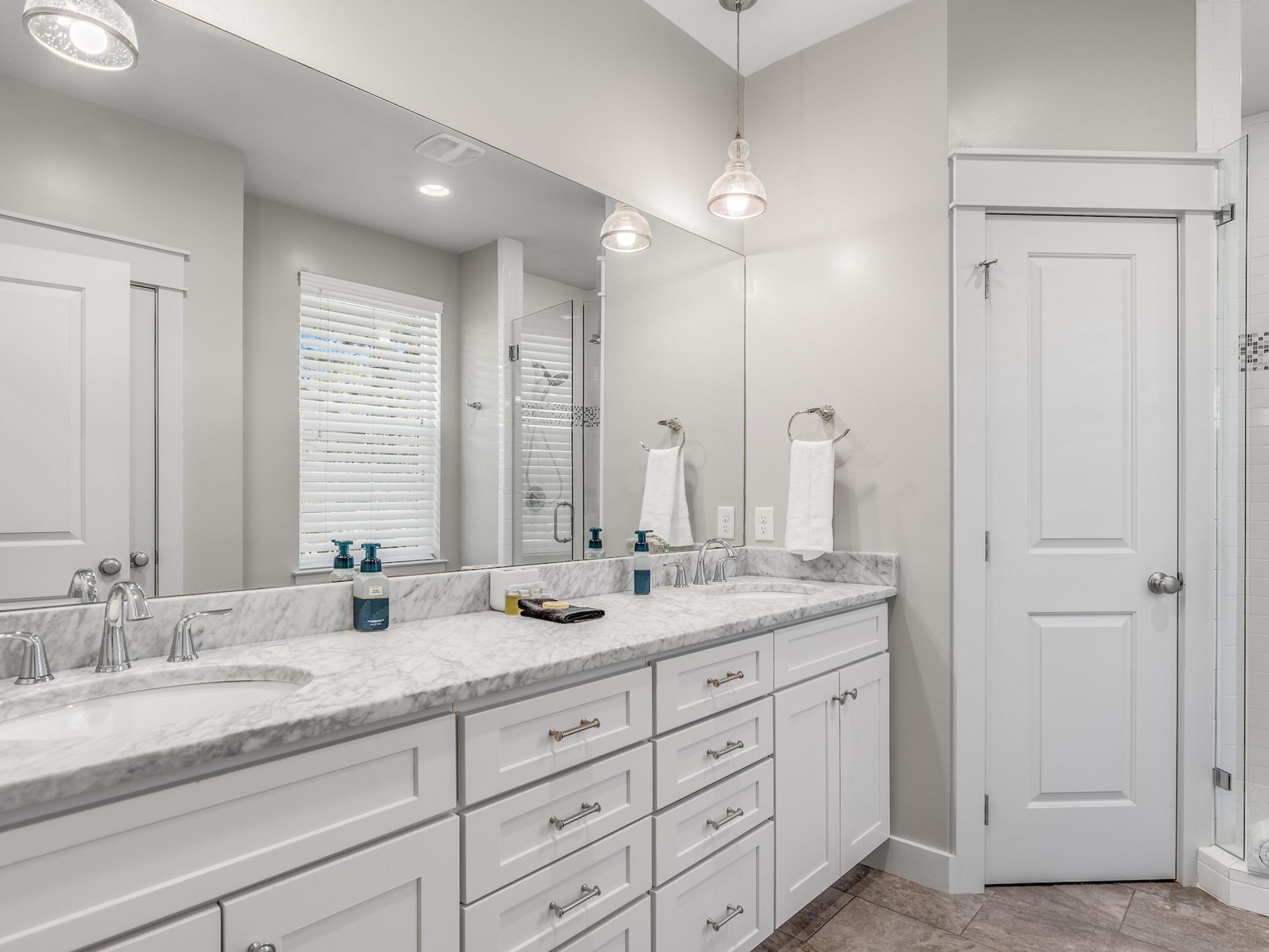 77 Snapper Street Santa Rosa Beach, FL 32459 - Photo 23 of 54 a bathroom with double sink and a mirror