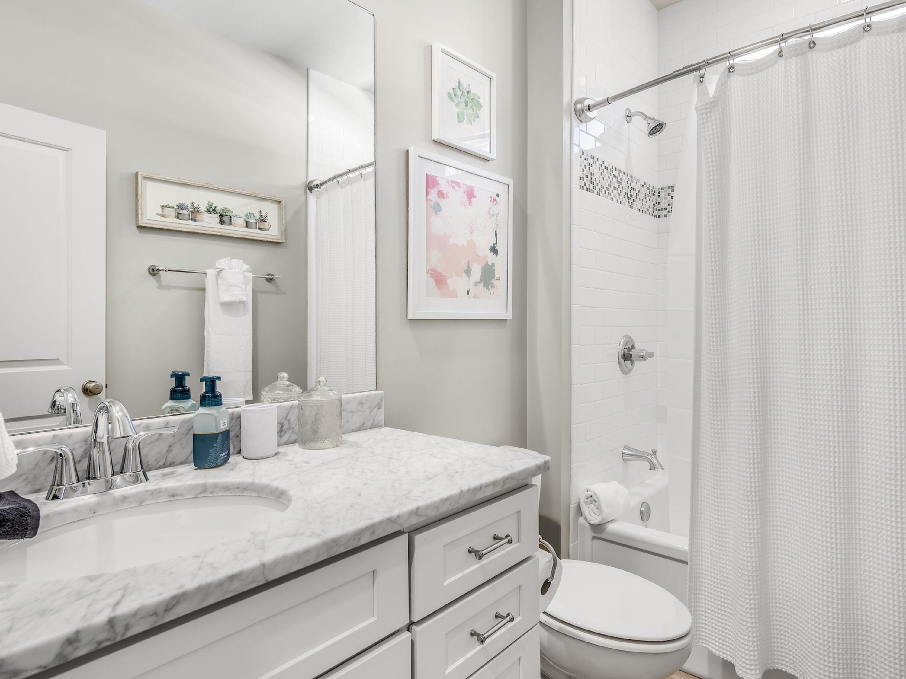 77 Snapper Street Santa Rosa Beach, FL 32459 - Photo 29 of 54 a bathroom with a granite countertop sink a toilet and shower