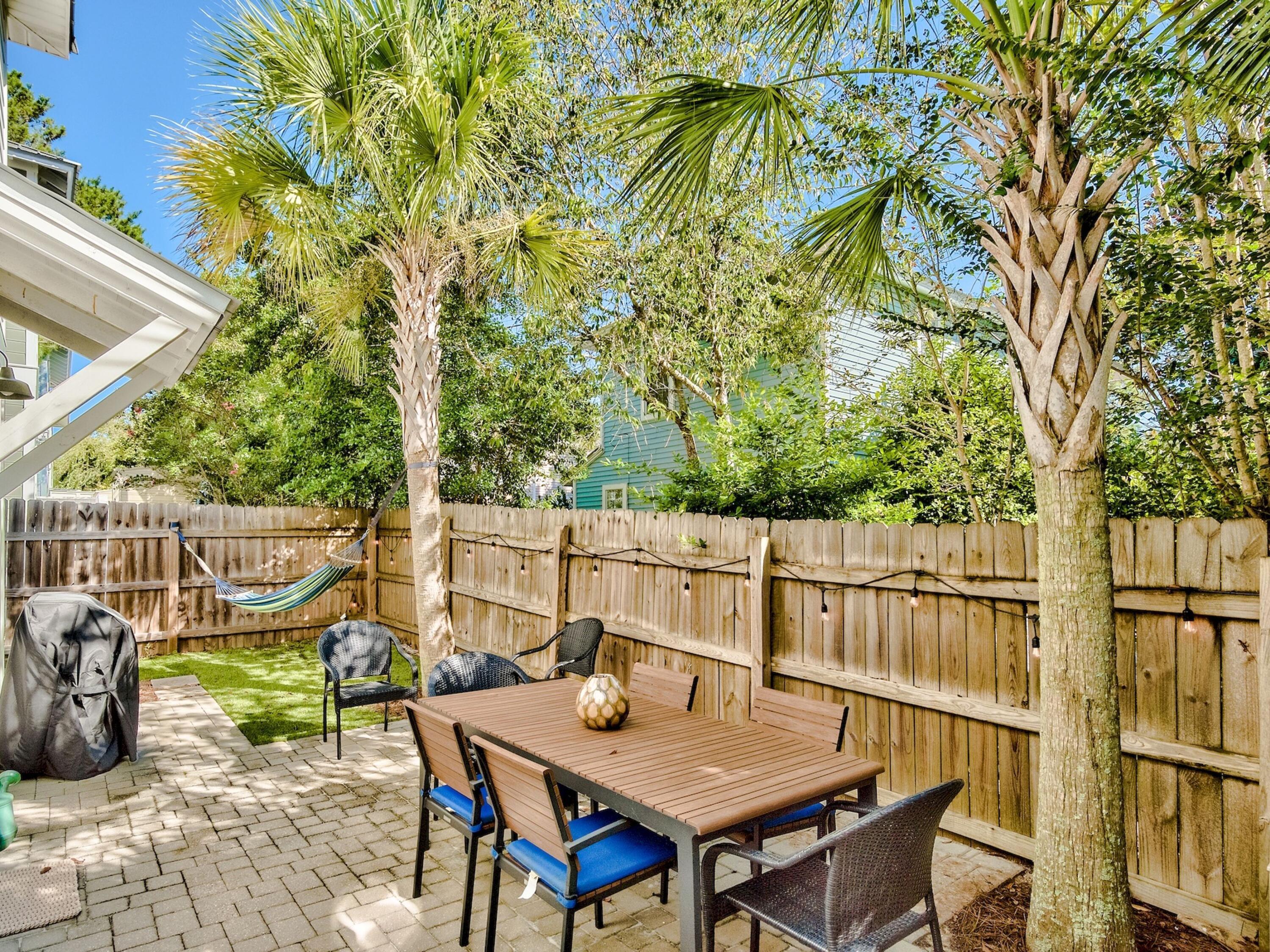77 Snapper Street Santa Rosa Beach, FL 32459 - Photo 31 of 54 a view of a chairs and table in patio