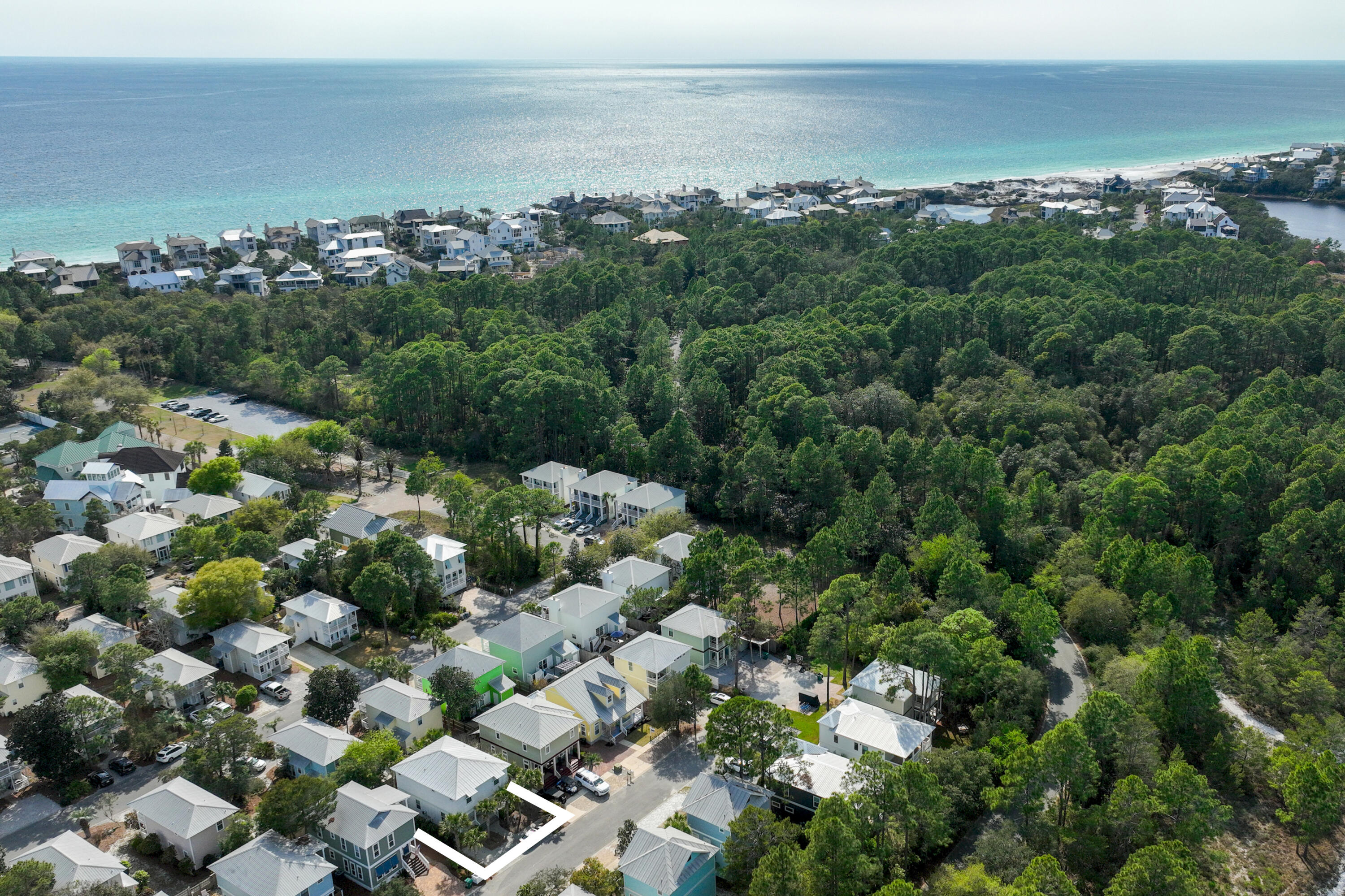 77 Snapper Street Santa Rosa Beach, FL 32459 - Photo 4 of 54 an aerial view of a houses with a yard