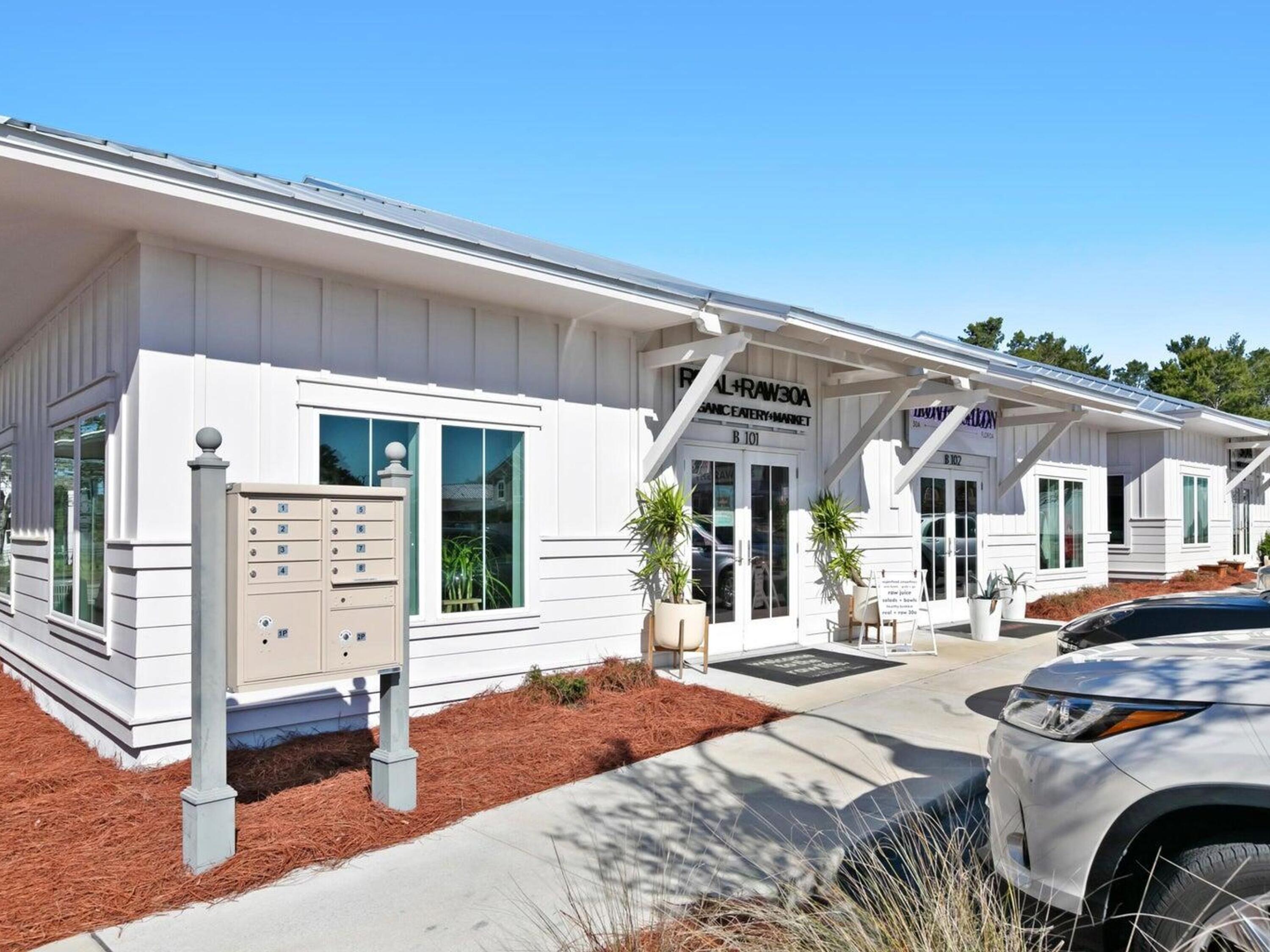 77 Snapper Street Santa Rosa Beach, FL 32459 - Photo 49 of 54 a front view of a house with parking area