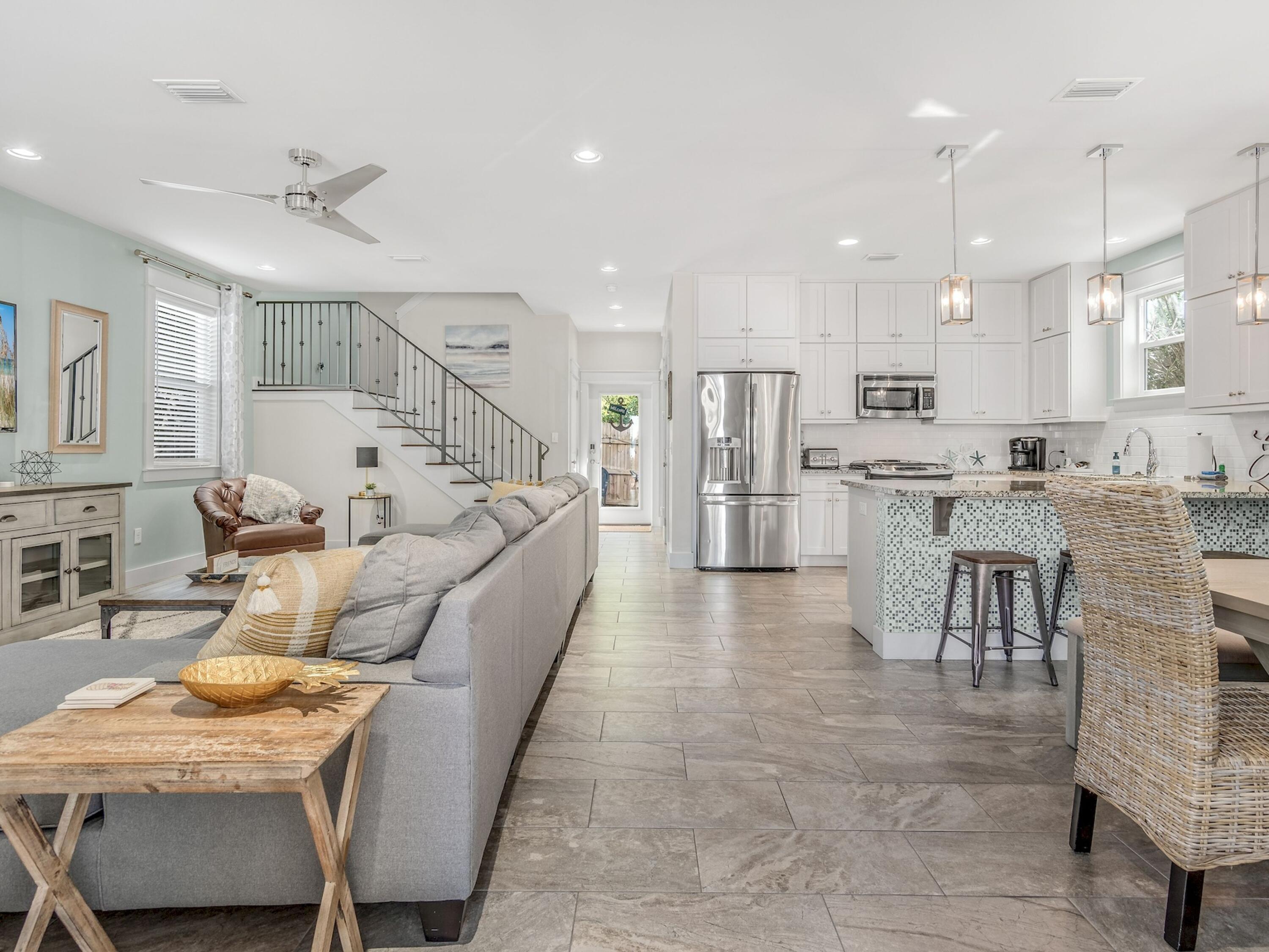 77 Snapper Street Santa Rosa Beach, FL 32459 - Photo 8 of 54 a living room with stainless steel appliances furniture and a kitchen view