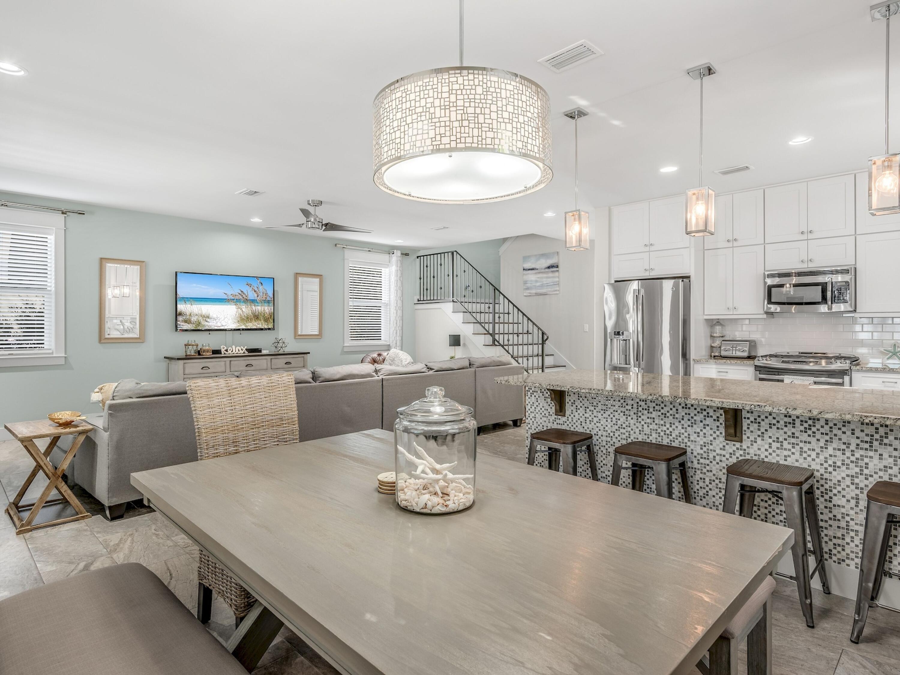 77 Snapper Street Santa Rosa Beach, FL 32459 - Photo 10 of 54 a large kitchen with a table and chairs