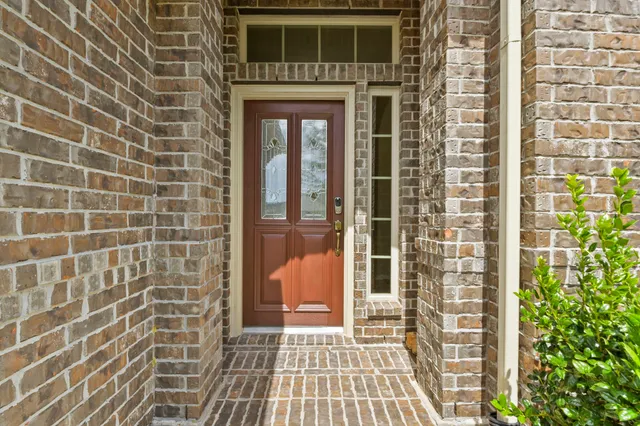 a view of a hallway with windows