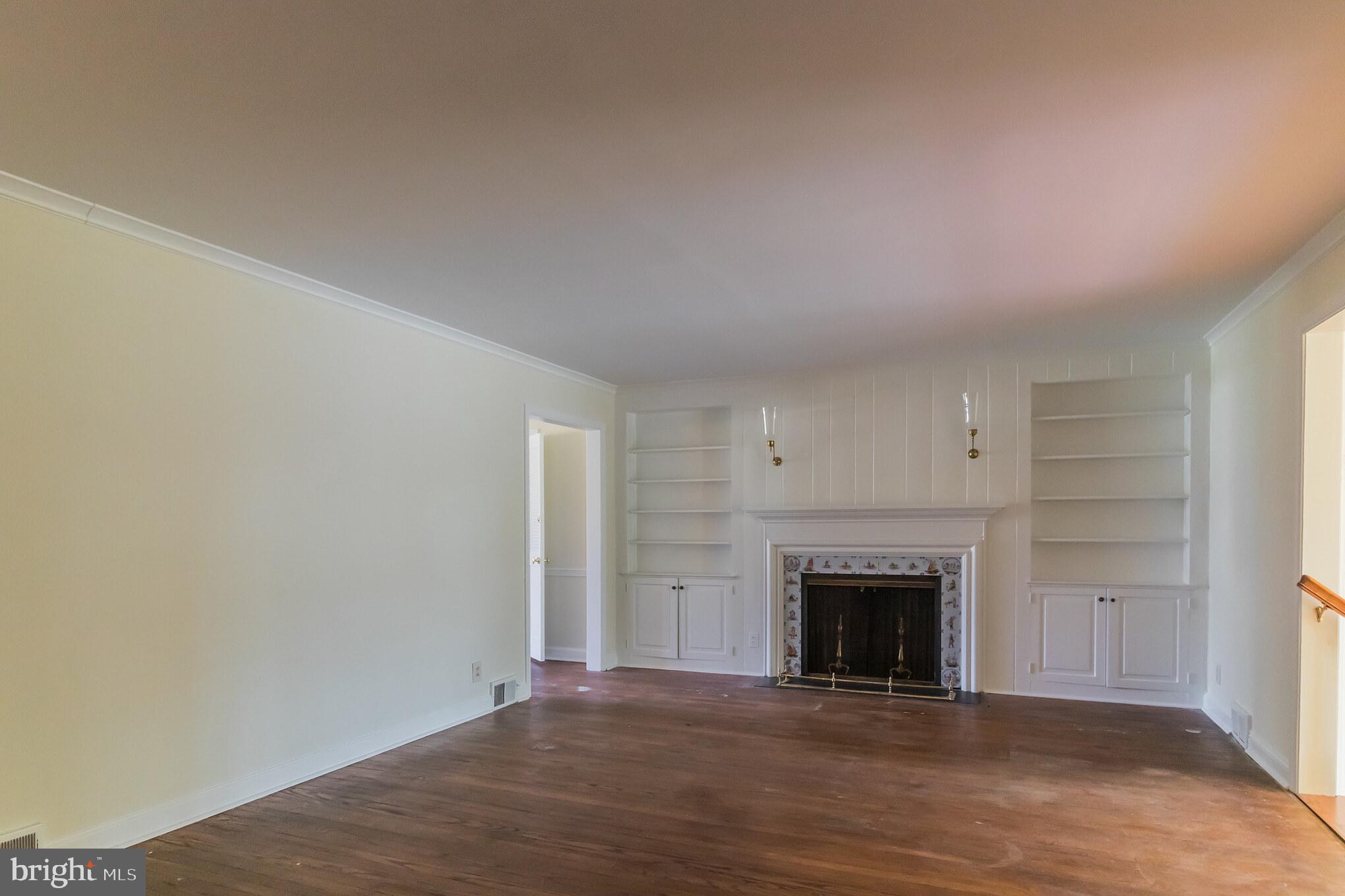 100 Steeplechase Road Devon, PA 19333 - Photo 6 of 33 Living Room with Fireplace and Built-ins