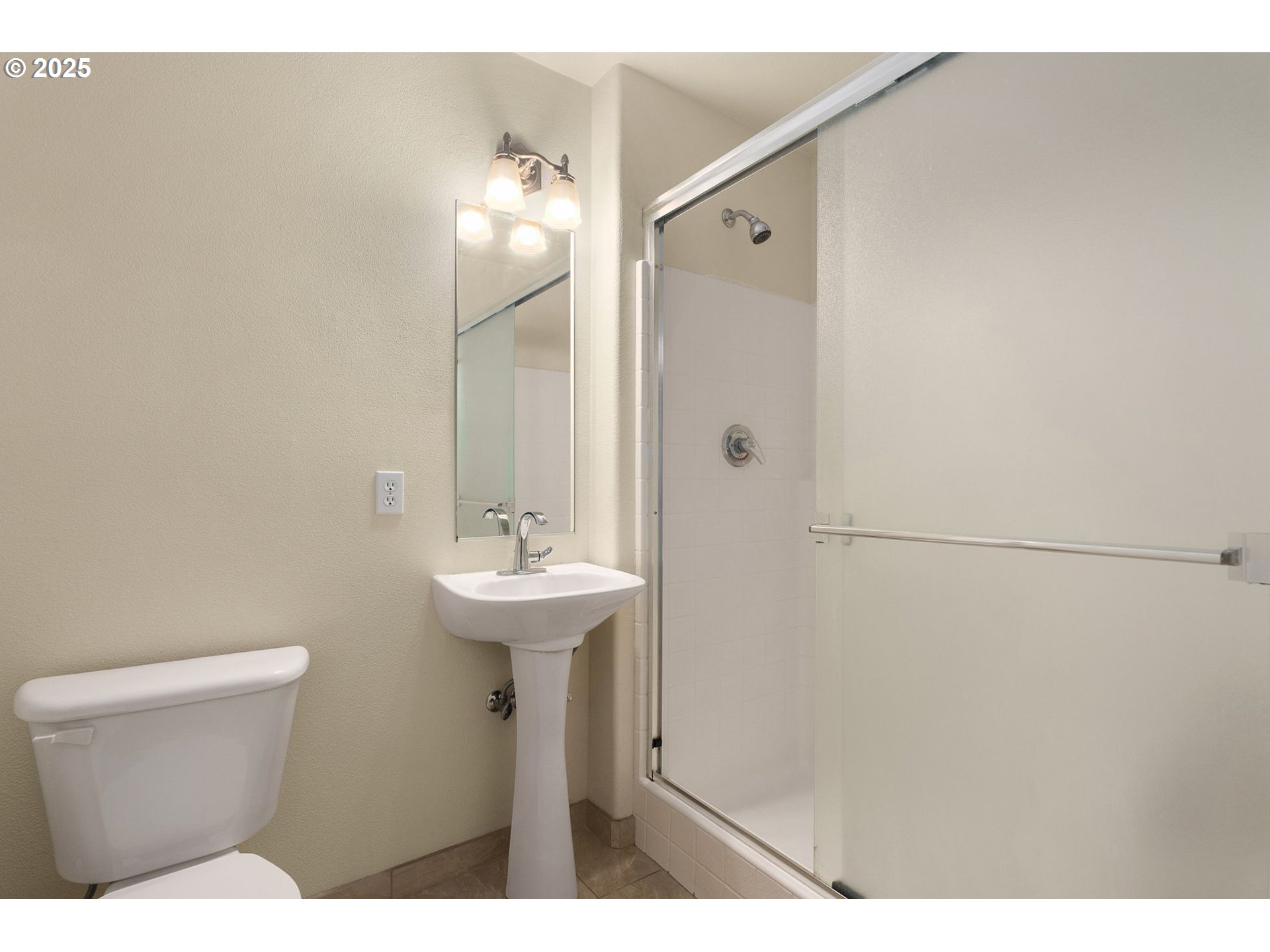 4540 Southwest 11th Street Gresham, OR 97080 - Photo 17 of 27 a bathroom with a sink and mirror