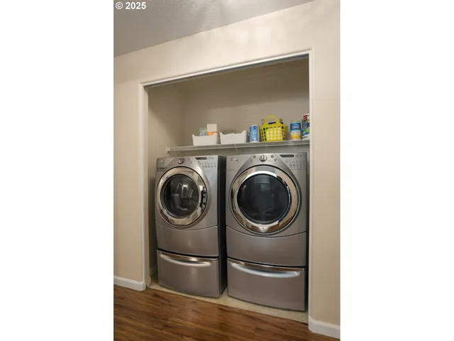 a utility room with dryer and washer