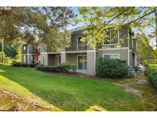 a view of a yard in front of house