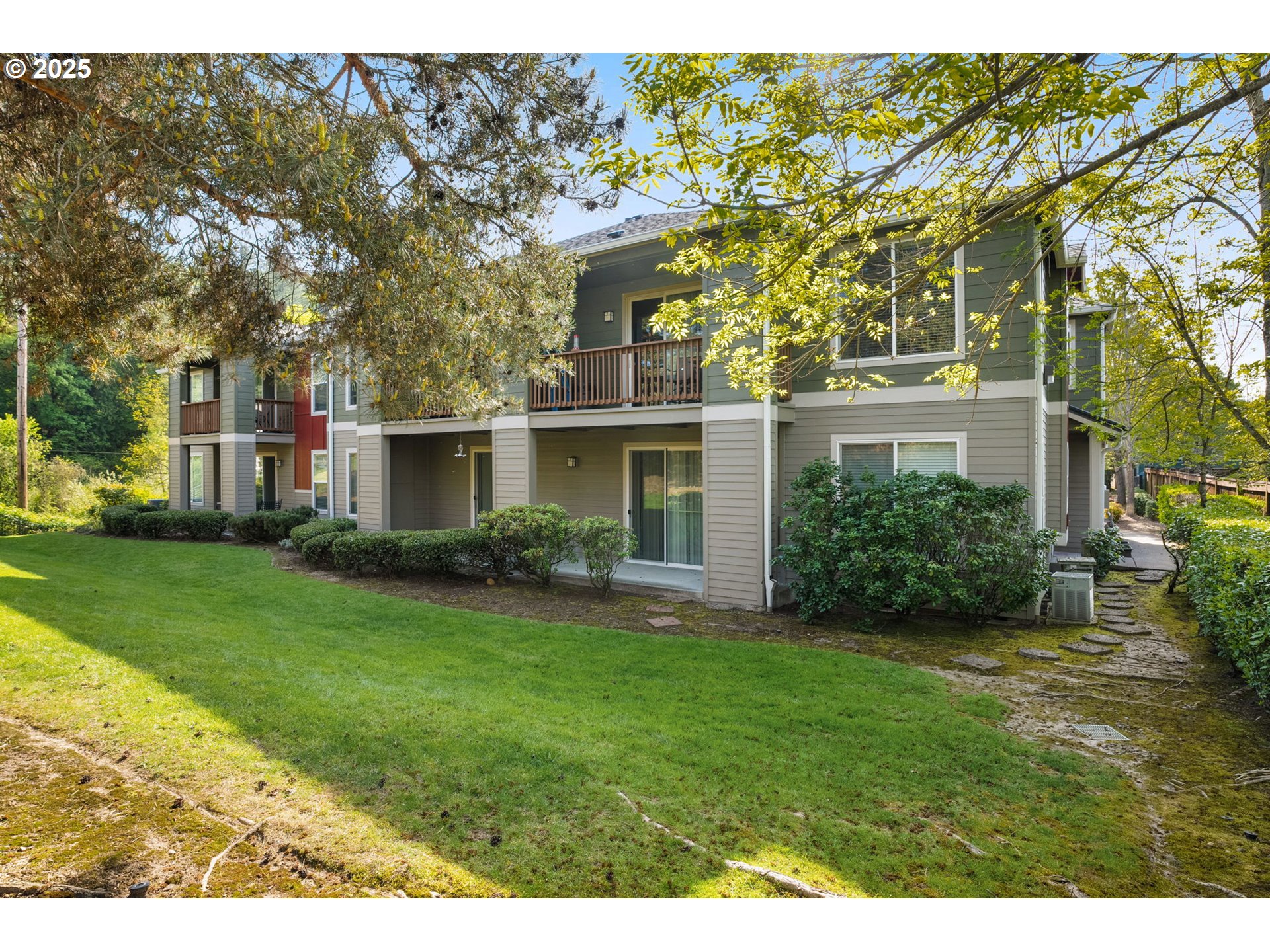 4540 Southwest 11th Street Gresham, OR 97080 - Photo 19 of 27 a view of a yard in front of house