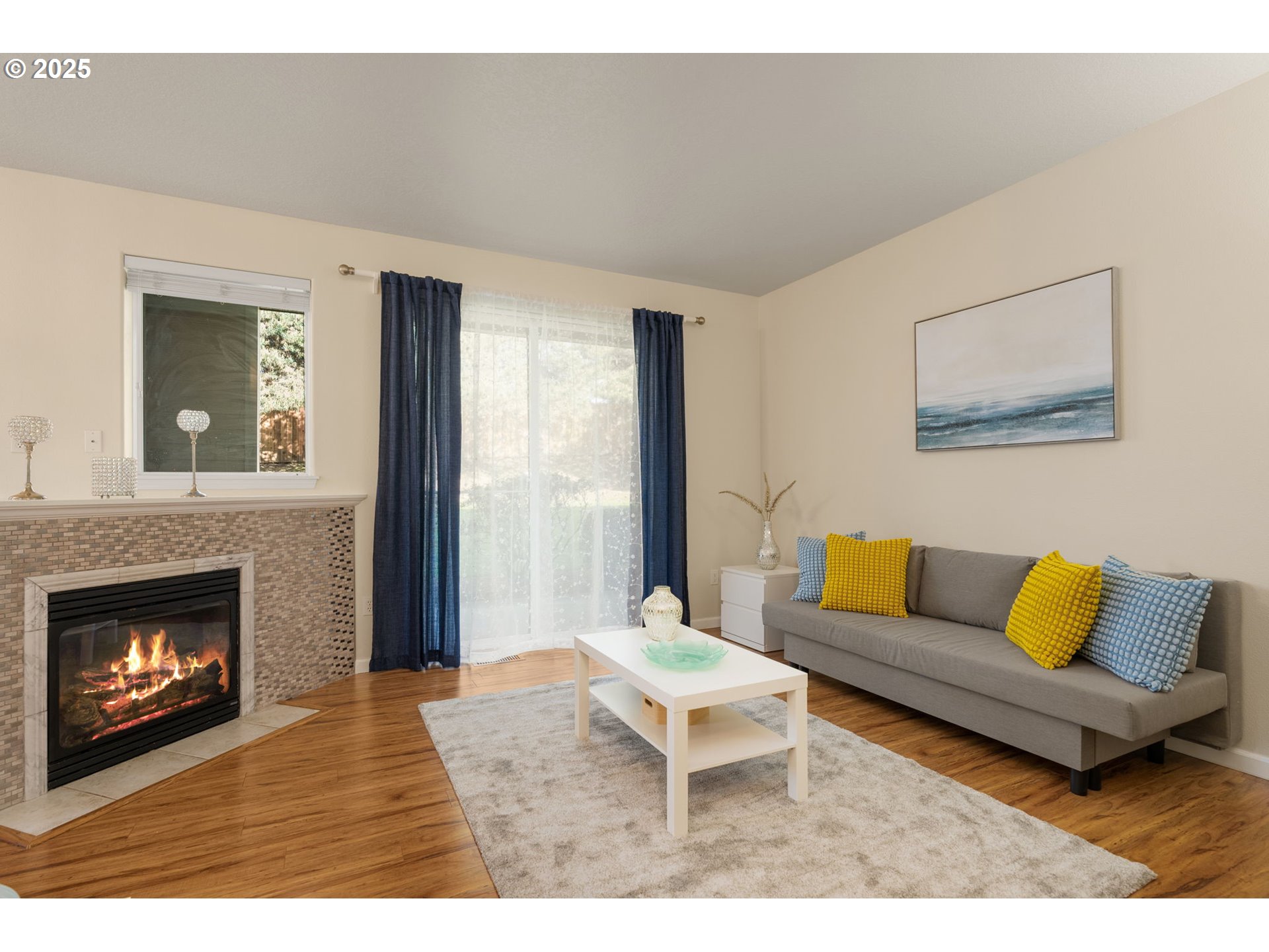 4540 Southwest 11th Street Gresham, OR 97080 - Photo 2 of 27 a living room with furniture and a fireplace