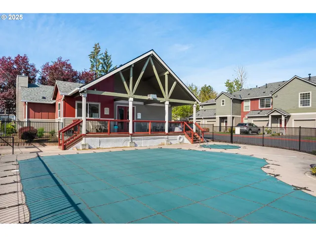 a view of a house with a yard porch and sitting area