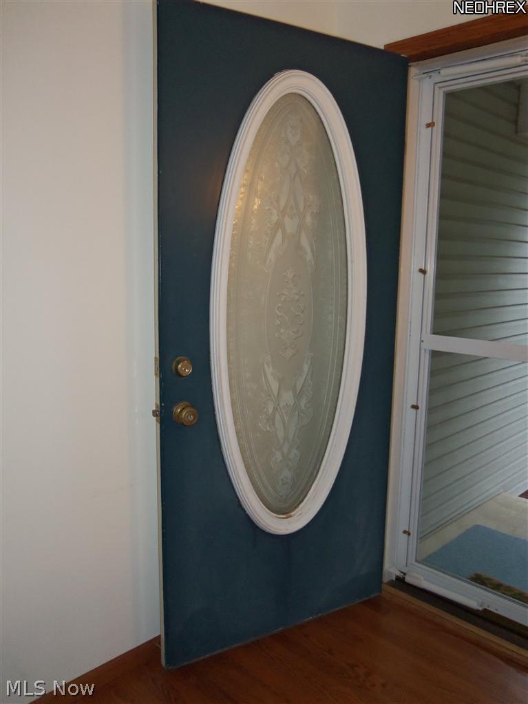 210 Birch Road Painesville, OH 44077 - Photo 3 of 25 THE DESIGNER FRONT DOOR SAYS WELCOME TO FAMILY AND FRIENDS.