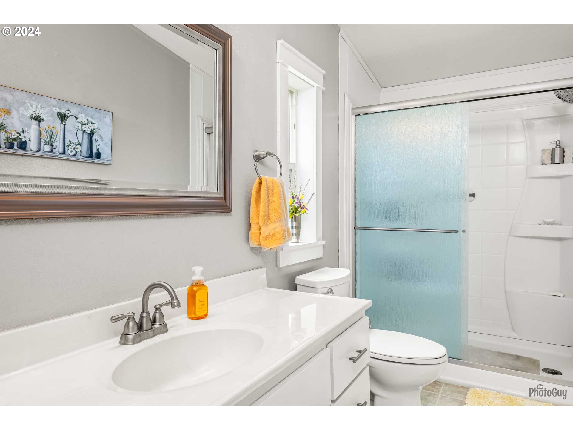 90640 Marcola Road Springfield, OR 97478 - Photo 20 of 40 a bathroom with a sink a toilet and shower