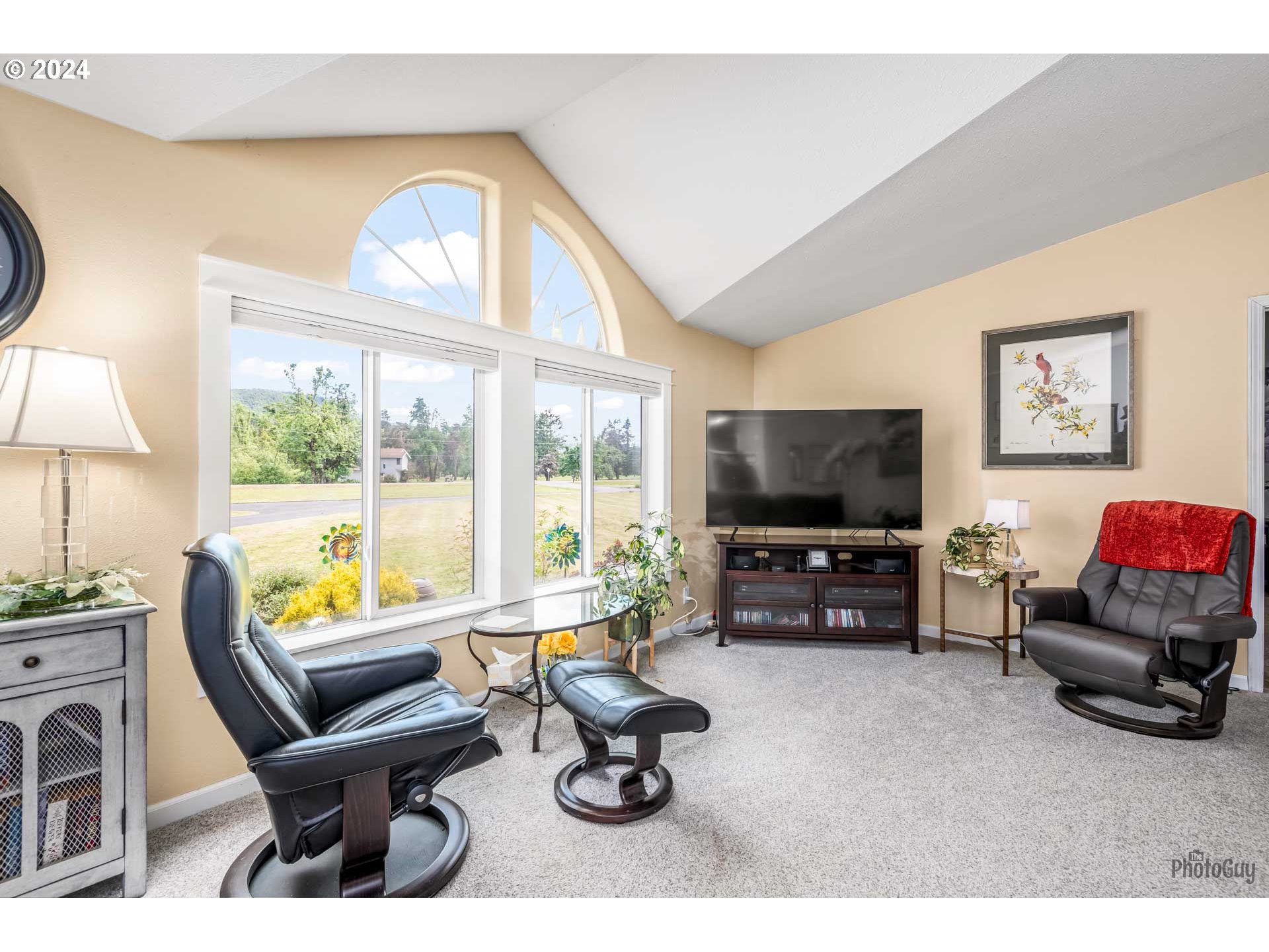 90640 Marcola Road Springfield, OR 97478 - Photo 2 of 40 a living room with furniture and a flat screen tv