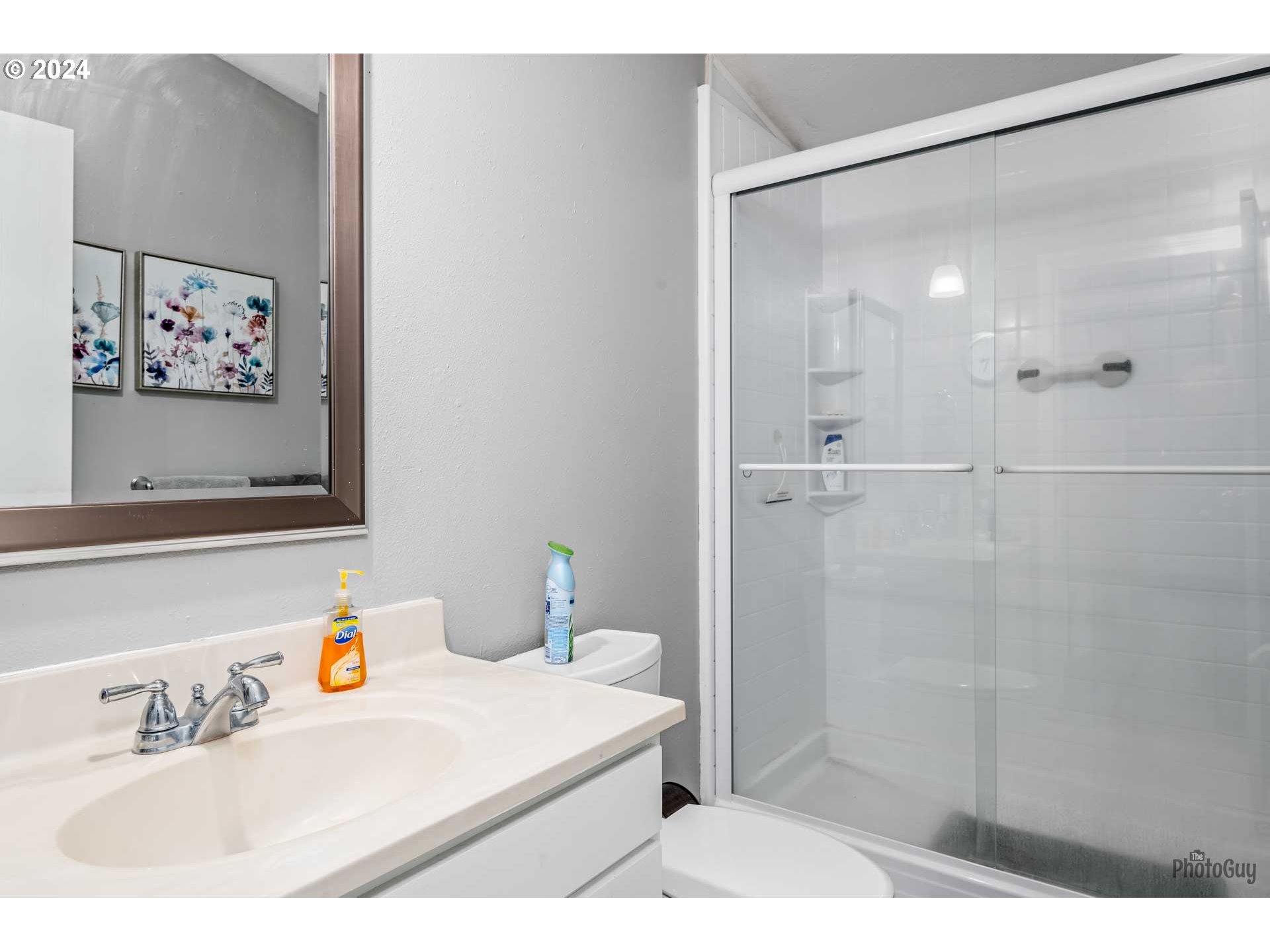90640 Marcola Road Springfield, OR 97478 - Photo 25 of 40 a bathroom with a sink and a mirror