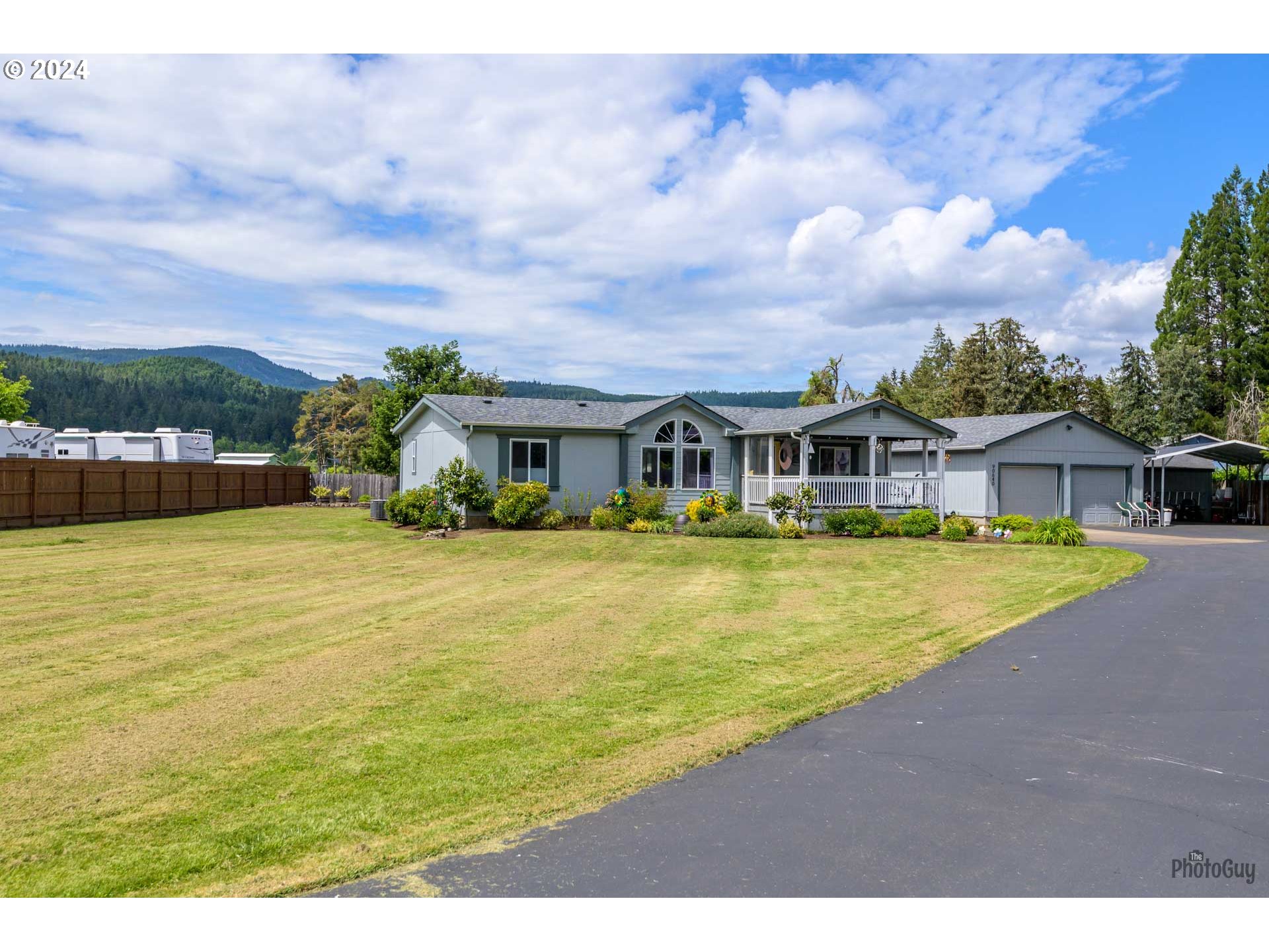 90640 Marcola Road Springfield, OR 97478 - Photo 36 of 40 a view of a swimming pool and a yard