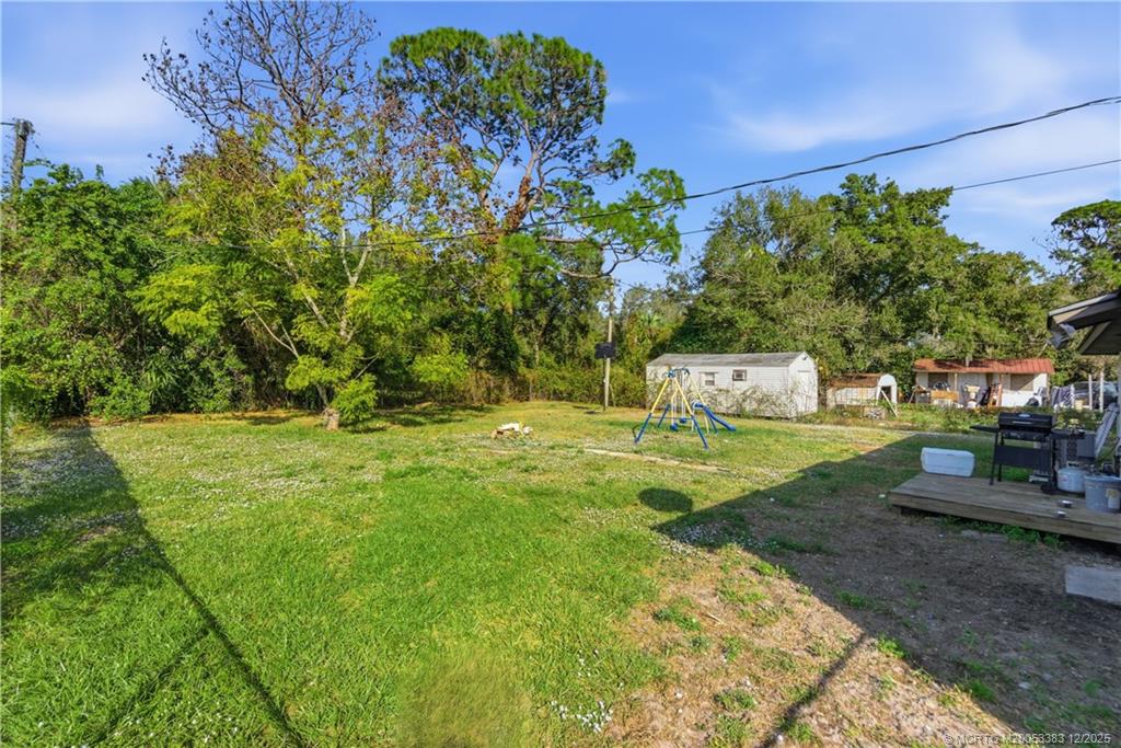 3031 Northwest 2nd Street Okeechobee, FL 34972 - Photo 17 of 19 a garden view
