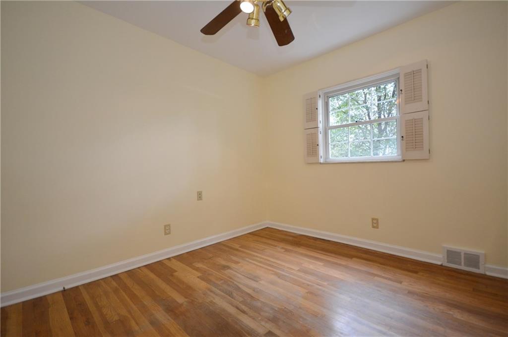 101 Colonial Drive McKees Rocks, PA 15136 - Photo 12 of 25 Bedroom on main floor includes a closet and ceiling fan.