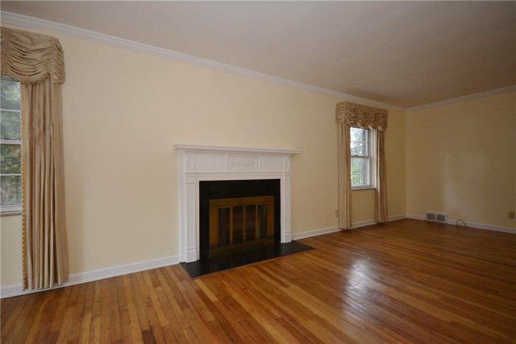 101 Colonial Drive McKees Rocks, PA 15136 - Photo 4 of 25 Wood burning fireplace in living room
