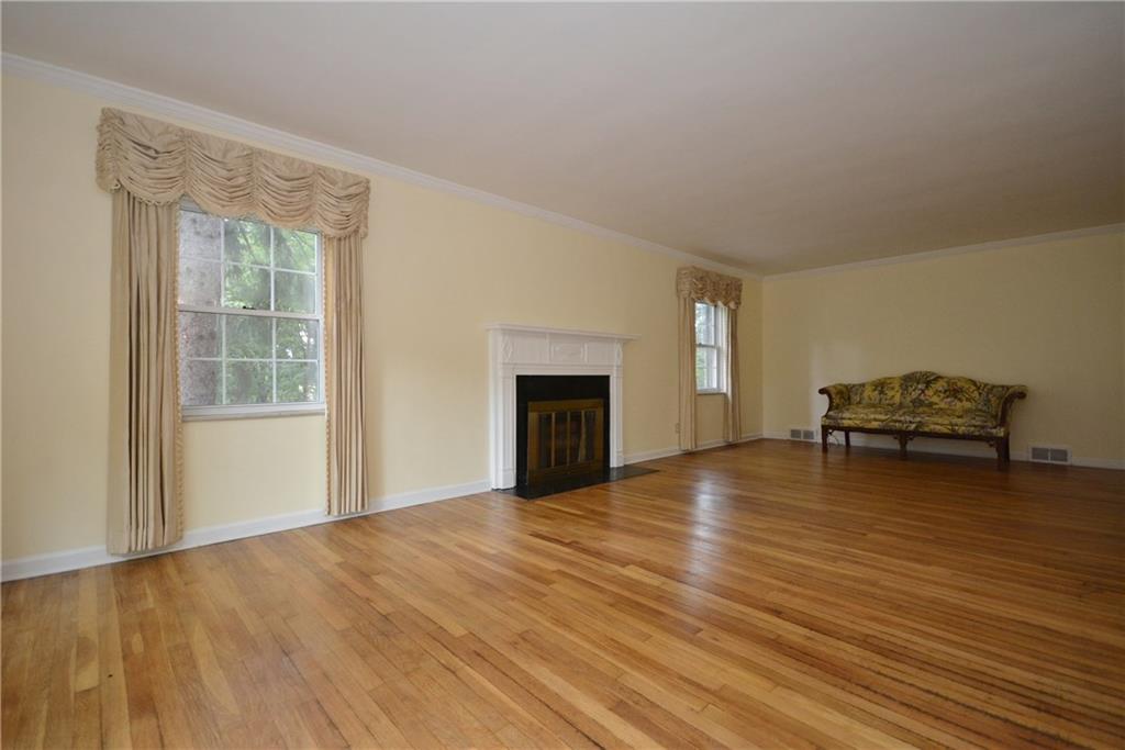 101 Colonial Drive McKees Rocks, PA 15136 - Photo 5 of 25 Living room includes wood burning fireplace