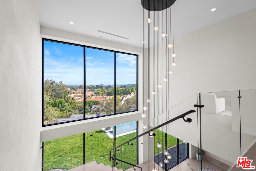 5340 Whitman Road Hidden Hills, CA 91302 - Photo 24 of 57 a view of an entryway with a garden