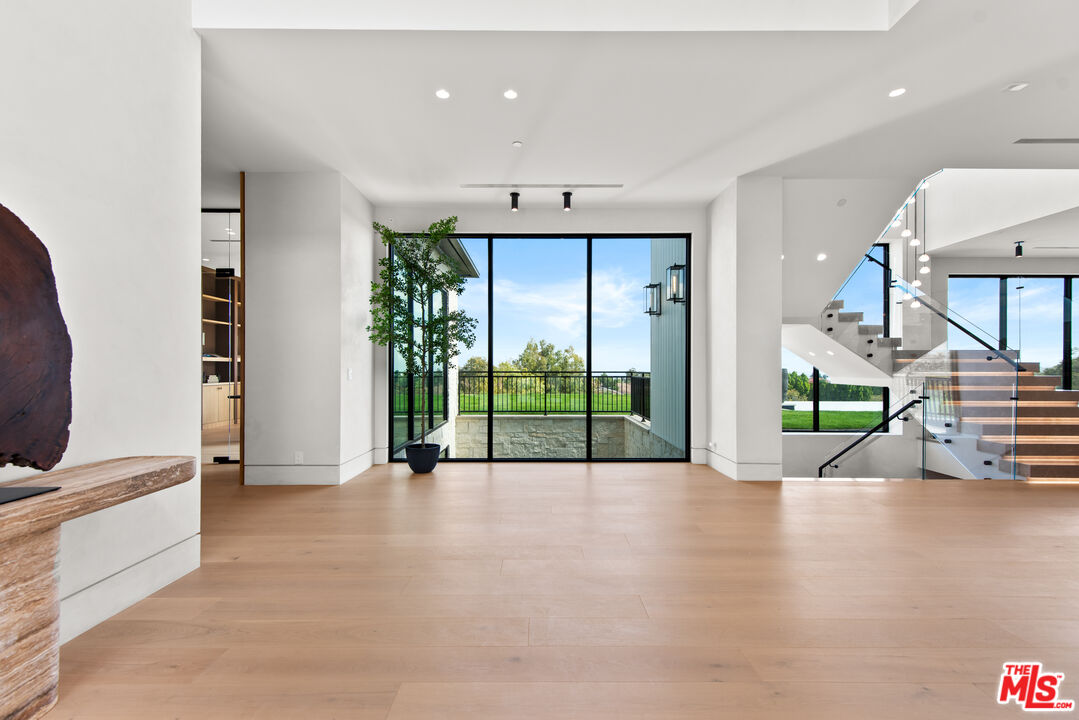 5340 Whitman Road Hidden Hills, CA 91302 - Photo 4 of 57 a view of an entryway with wooden floor