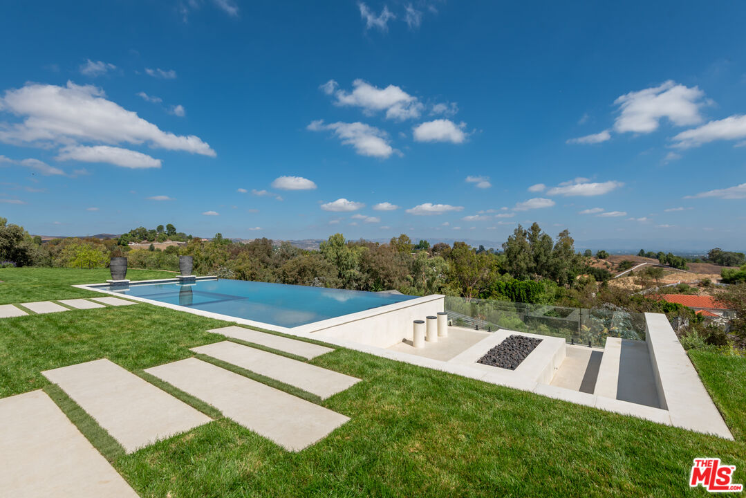 5340 Whitman Road Hidden Hills, CA 91302 - Photo 45 of 57 a view of a house with a yard