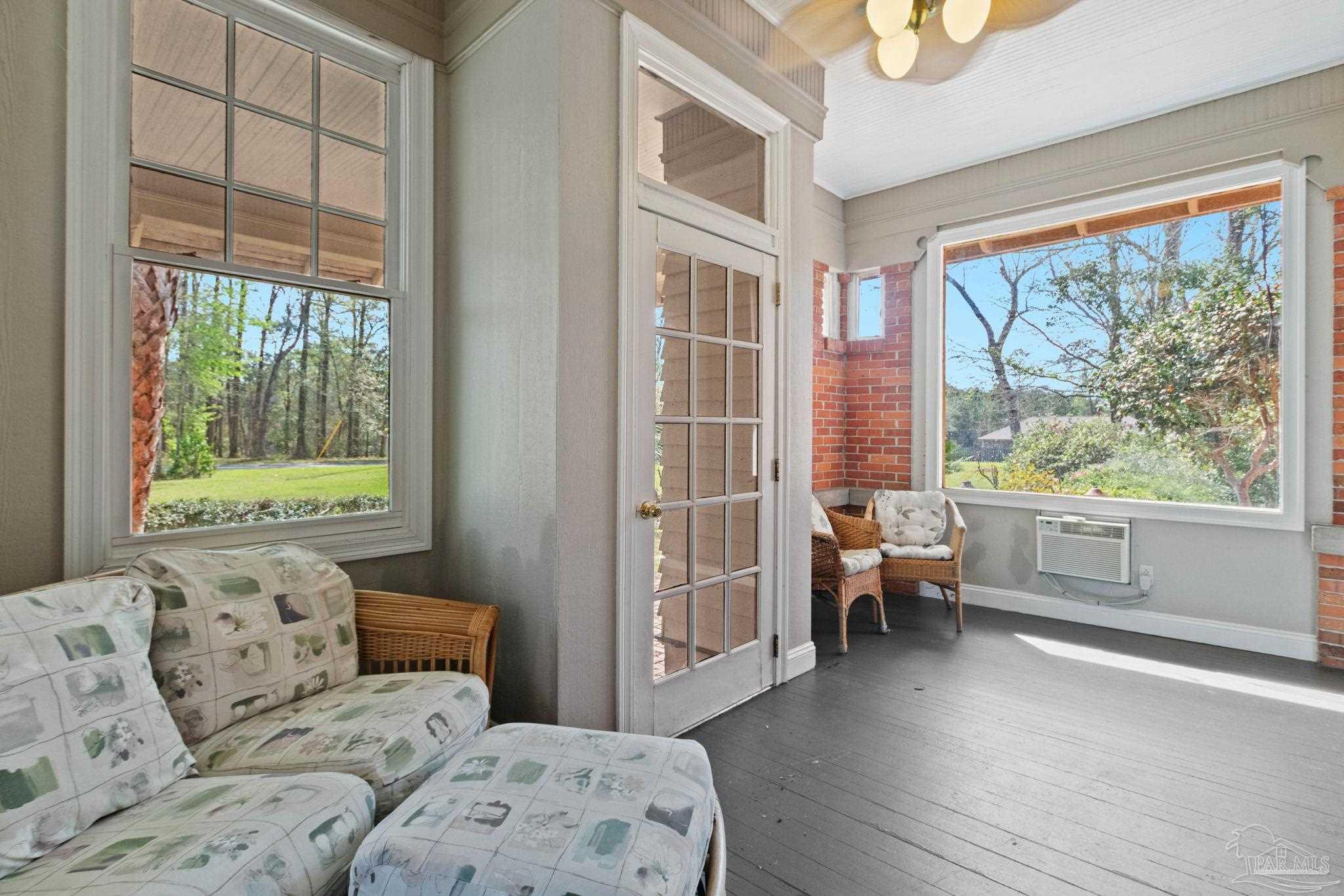 1701 Sowell Road Brewton, AL 36426 - Photo 67 of 72 a bedroom with a large bed and a large window with outer view