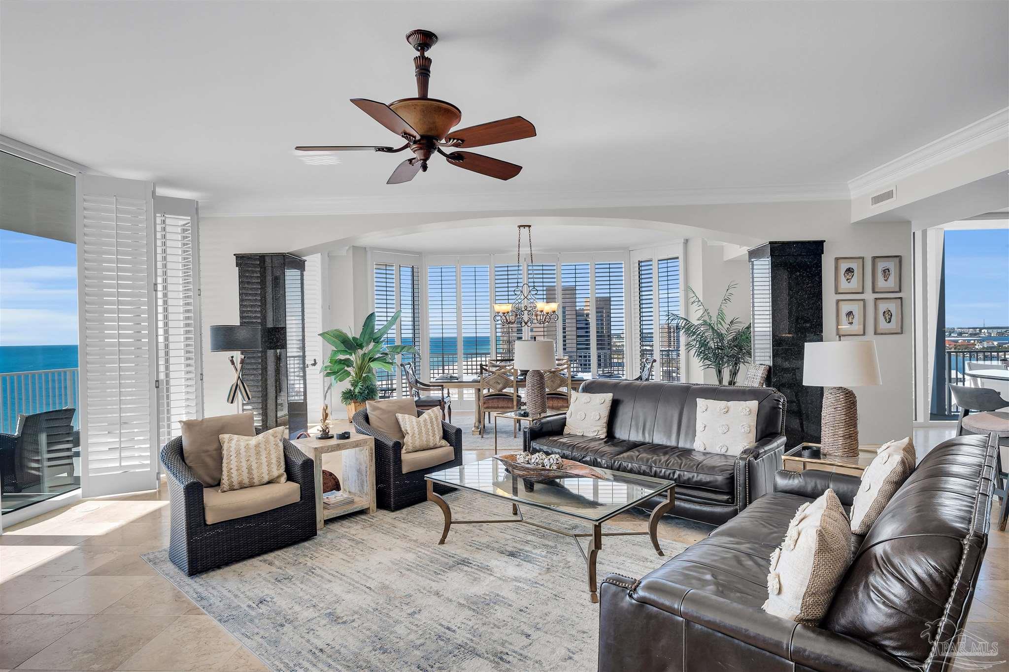 17361 Perdido Key Drive, Unit 1002W Perdido Key, FL 32507 - Photo 13 of 64 a living room with furniture and a large window