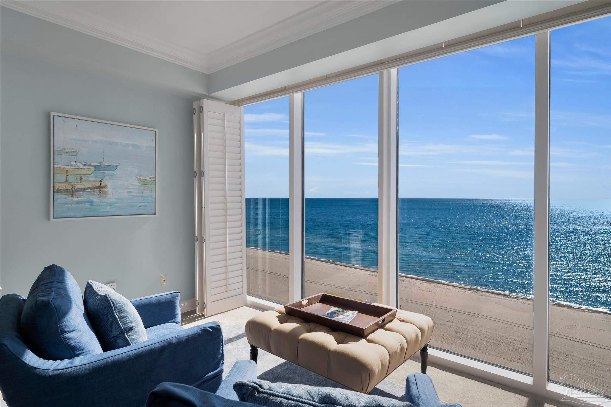 17361 Perdido Key Drive, Unit 1002W Perdido Key, FL 32507 - Photo 17 of 64 a living room with furniture and a floor to ceiling window