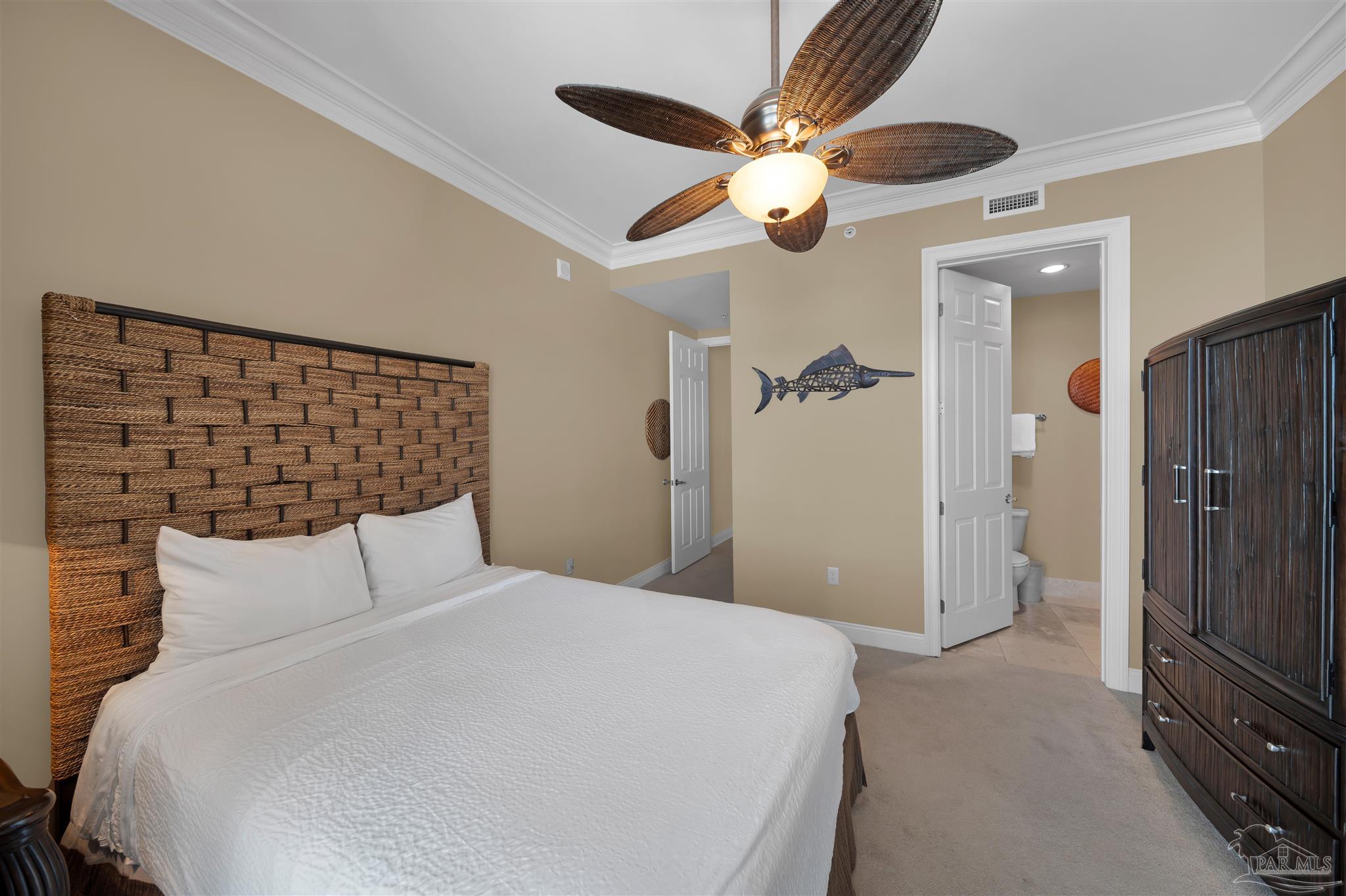 17361 Perdido Key Drive, Unit 1002W Perdido Key, FL 32507 - Photo 26 of 64 a bedroom with a large bed and a chandelier