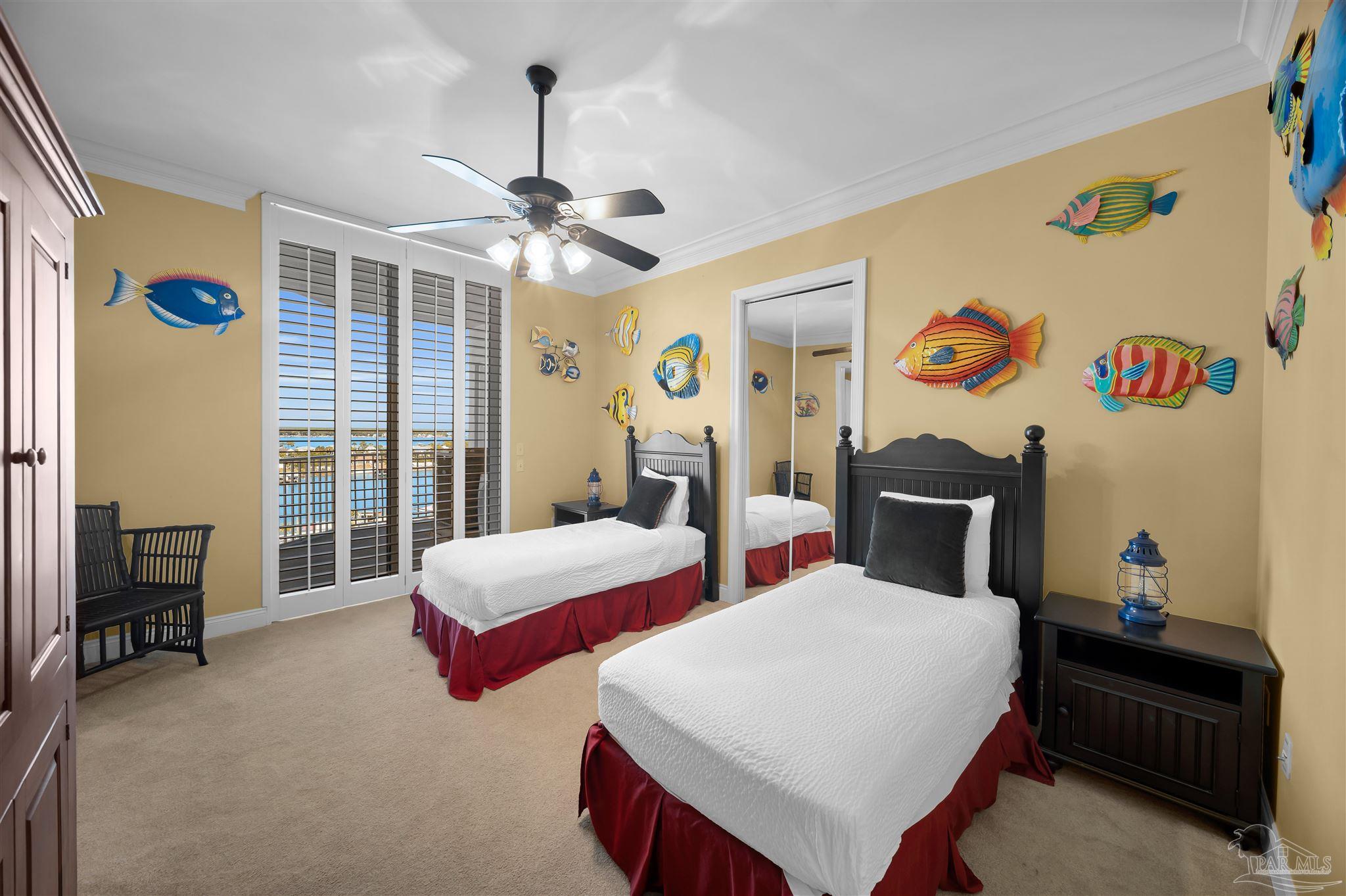 17361 Perdido Key Drive, Unit 1002W Perdido Key, FL 32507 - Photo 28 of 64 a bedroom with two beds and a window