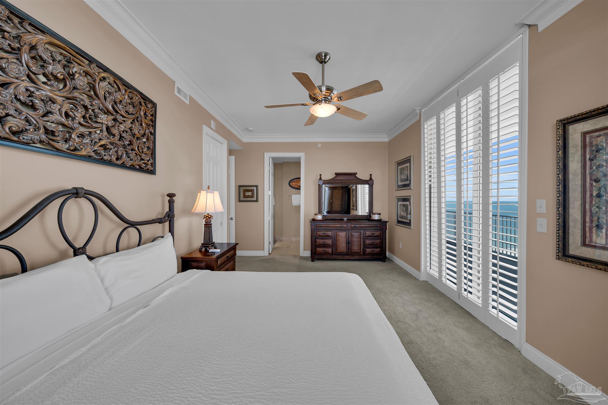 17361 Perdido Key Drive, Unit 1002W Perdido Key, FL 32507 - Photo 33 of 64 a bedroom with a bed and a large window with the outer view
