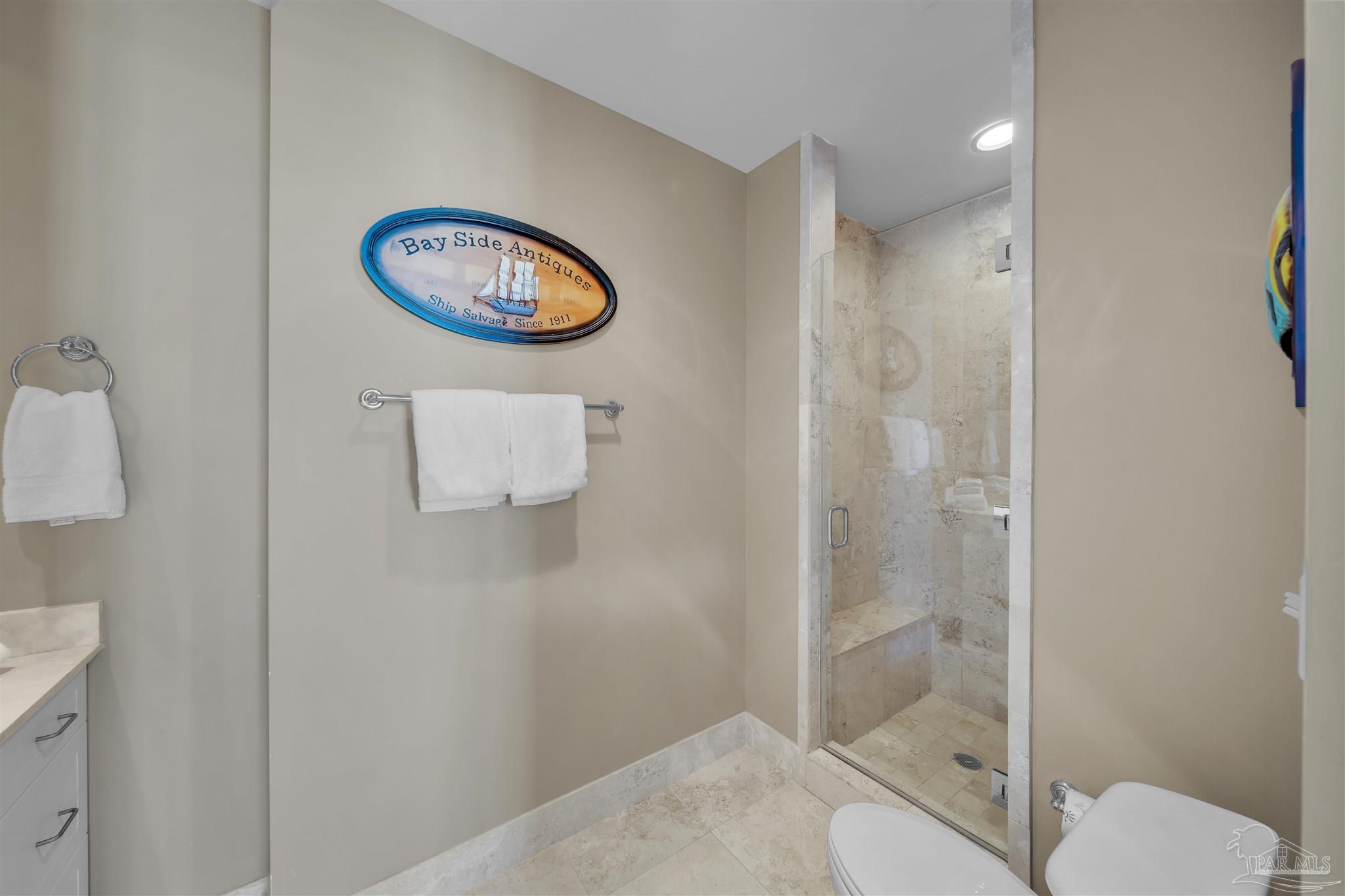 17361 Perdido Key Drive, Unit 1002W Perdido Key, FL 32507 - Photo 34 of 64 a bathroom with a sink and a mirror