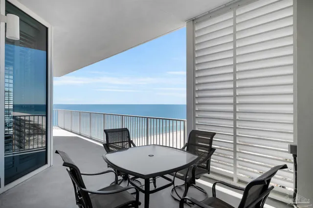 a view of a balcony with chairs